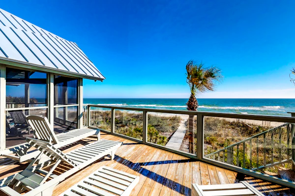 Snowbird-friendly beachfront home with a pool, tennis, washer/dryer, fireplace