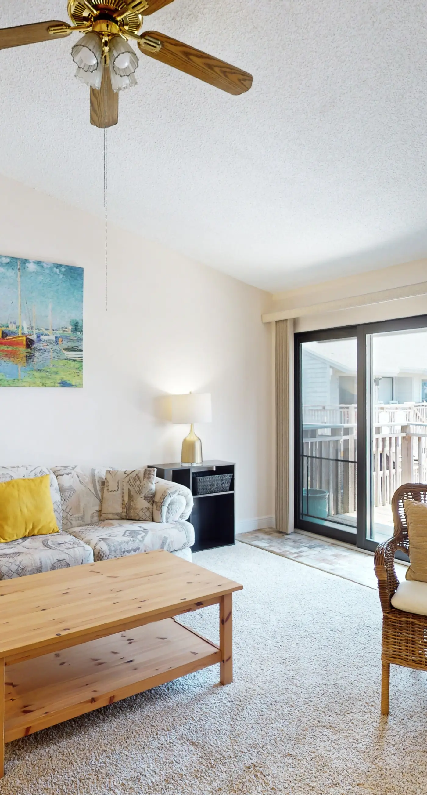 Comfortable townhome steps from beach with pool access, balcony, & W/D