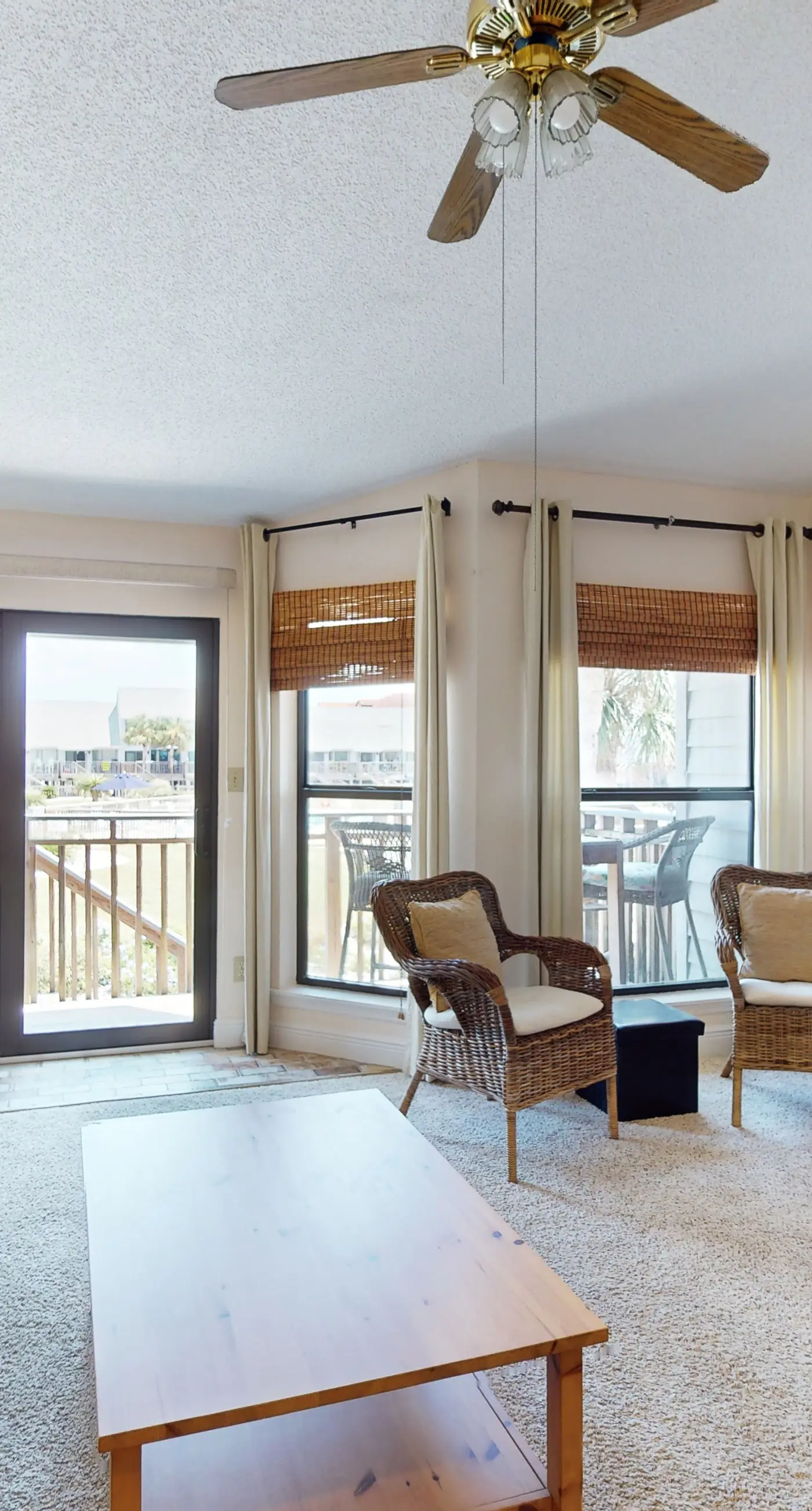 Comfortable townhome steps from beach with pool access, balcony, & W/D