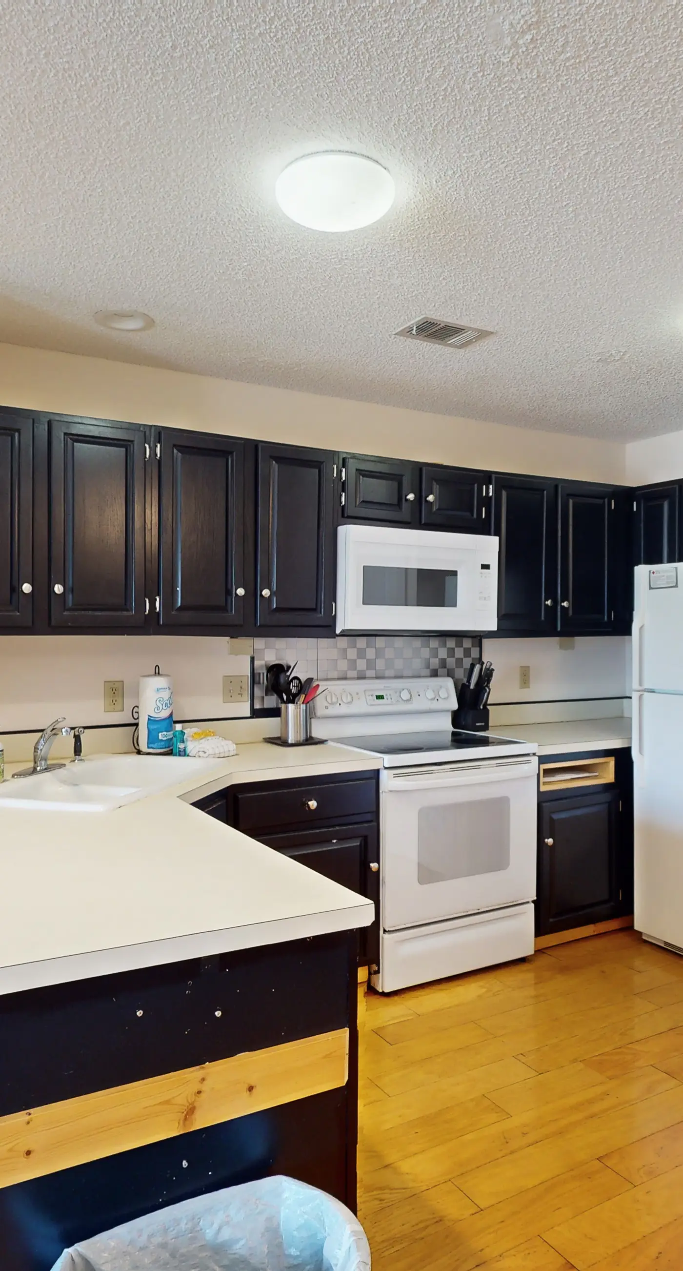 Comfortable townhome steps from beach with pool access, balcony, & W/D