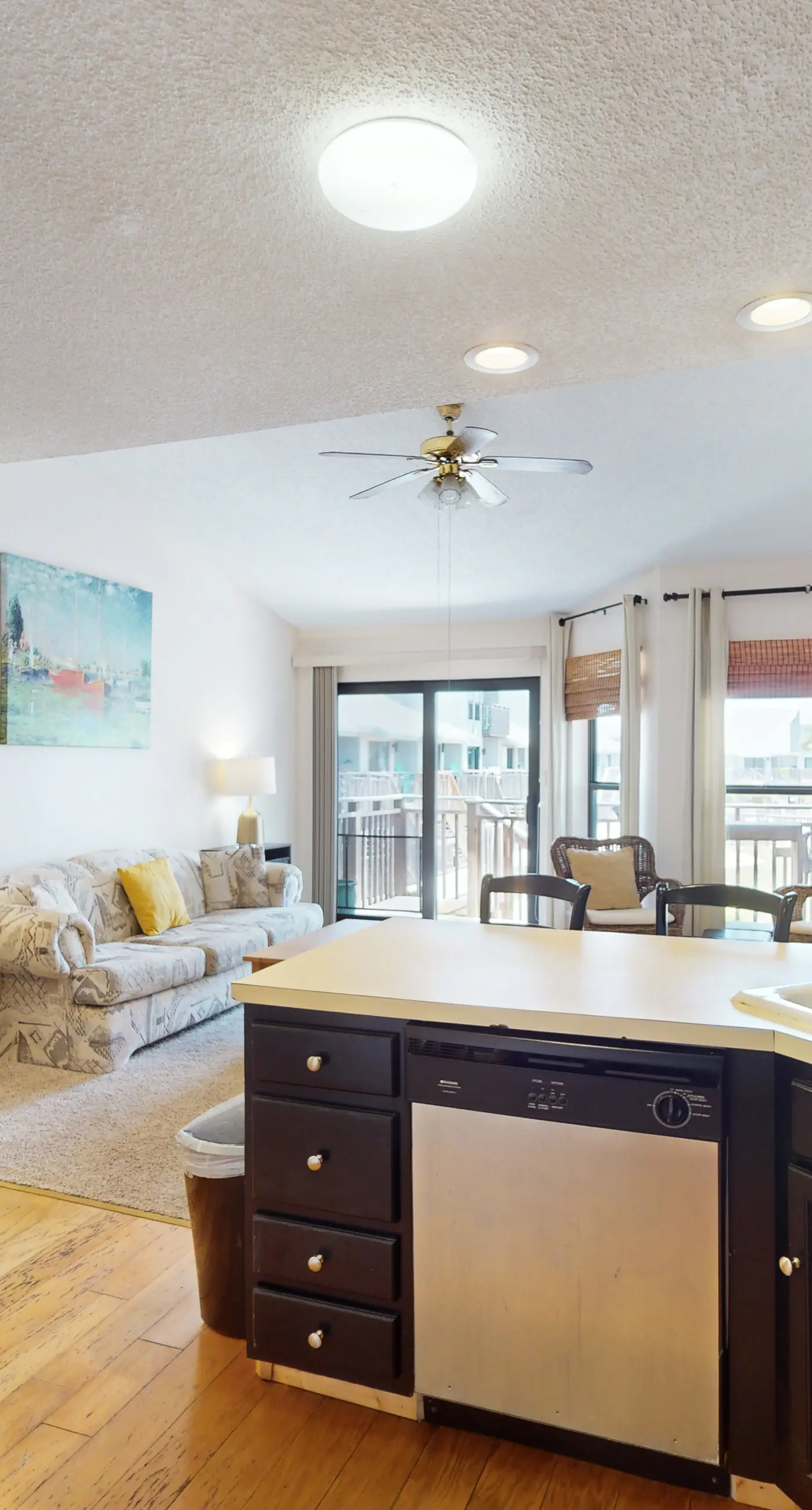Comfortable townhome steps from beach with pool access, balcony, & W/D