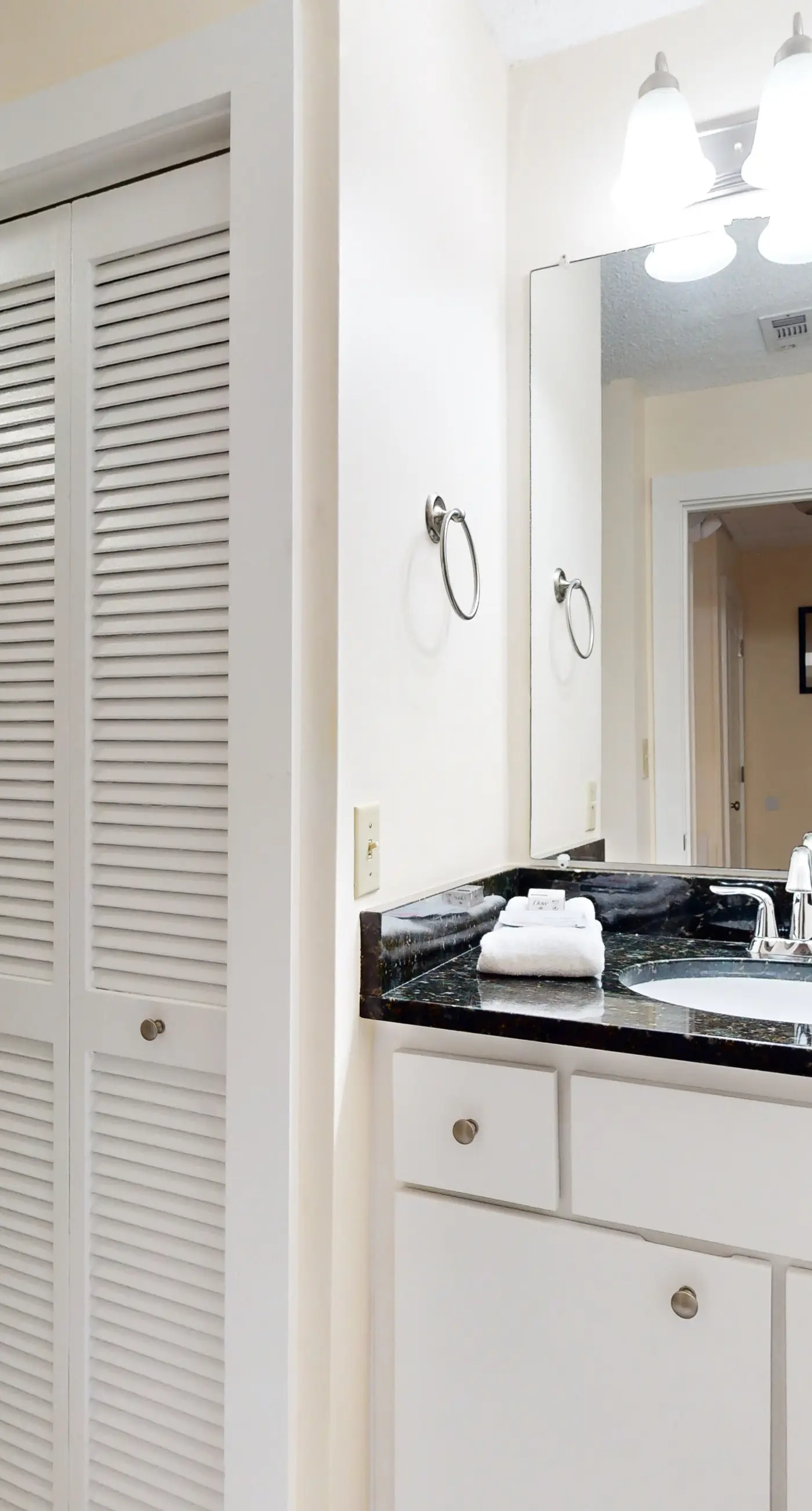 Comfortable townhome steps from beach with pool access, balcony, & W/D