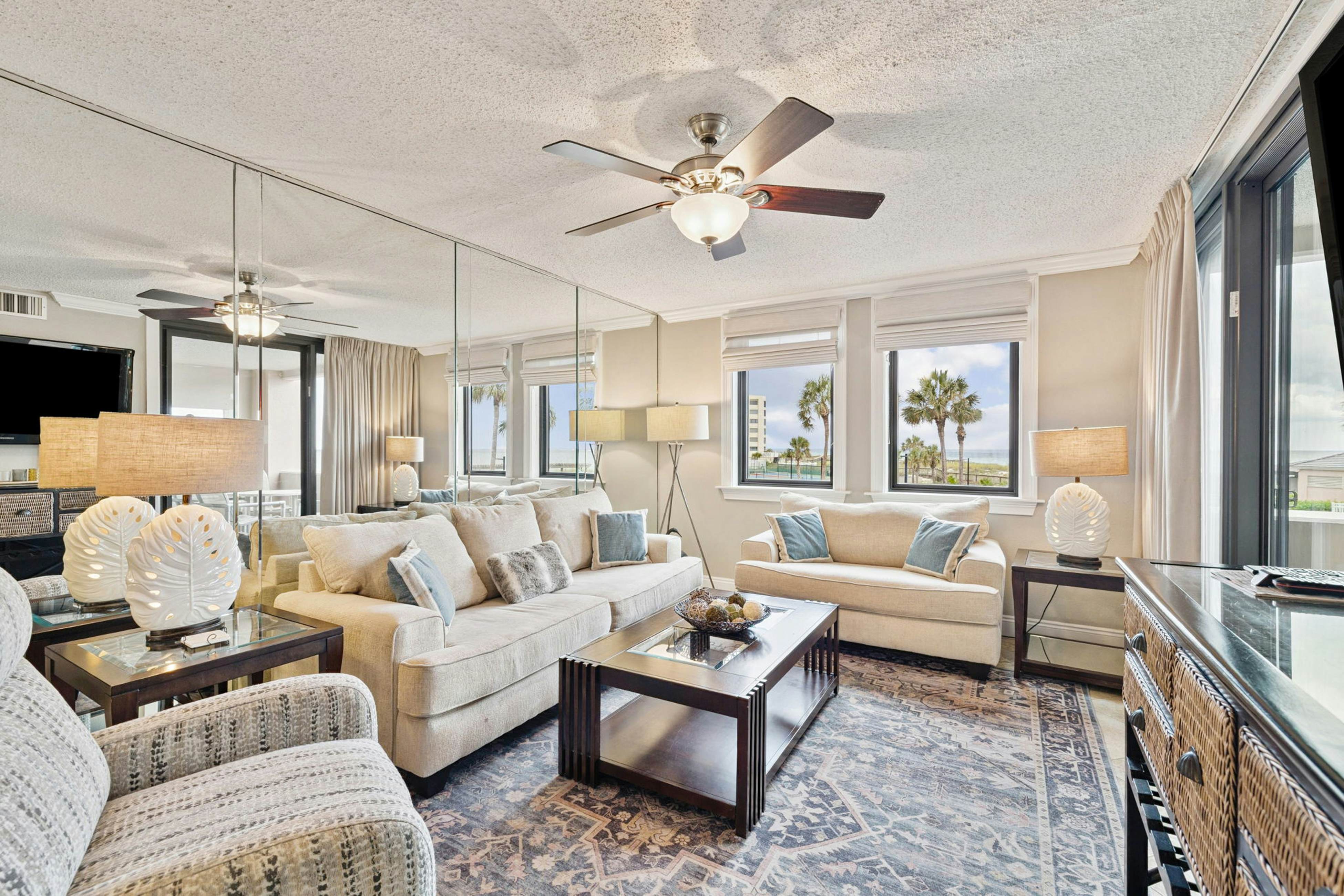 Bright ocean-view condo with community pool and direct beach walkway