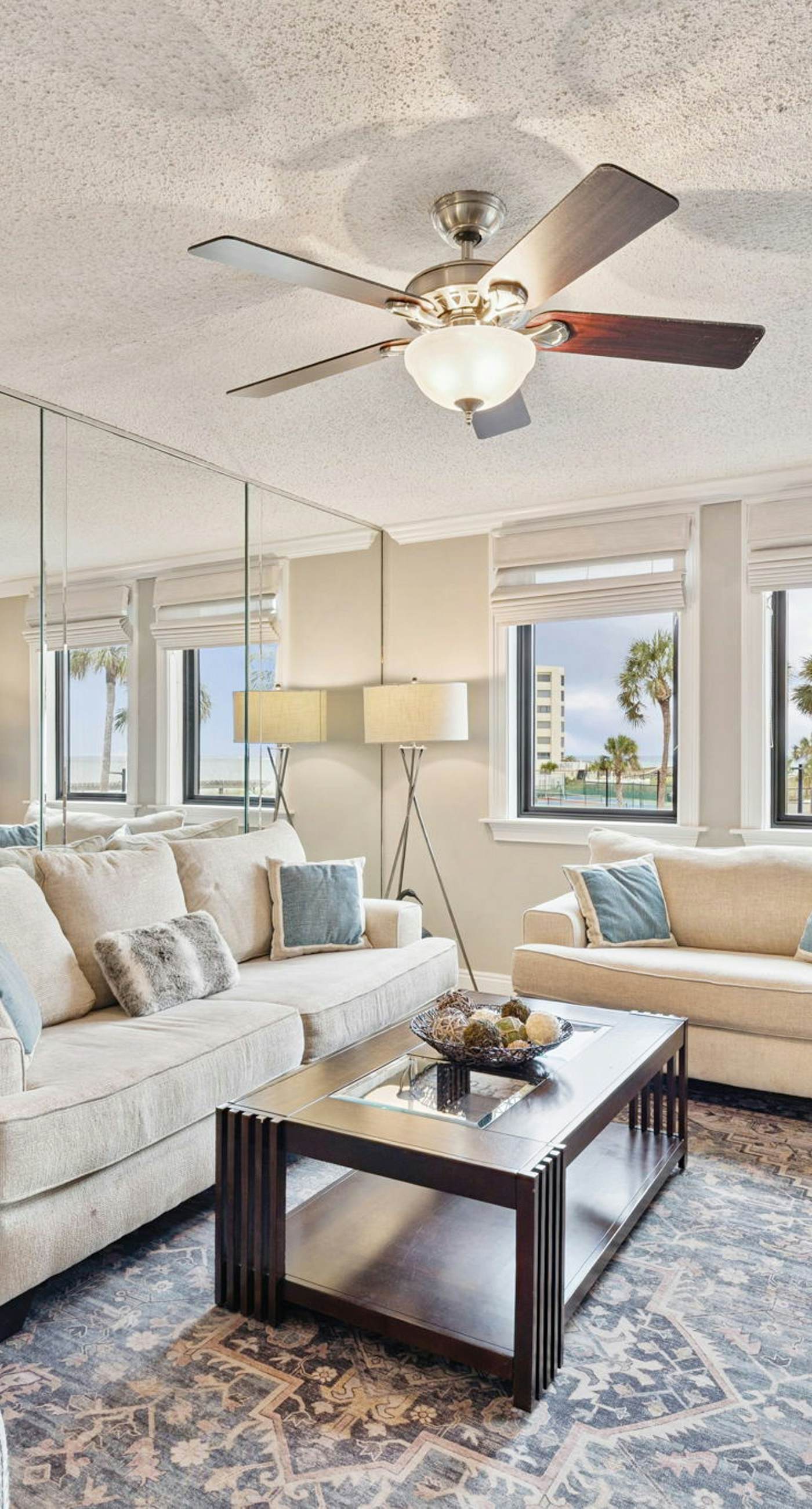 Bright ocean-view condo with community pool and direct beach walkway