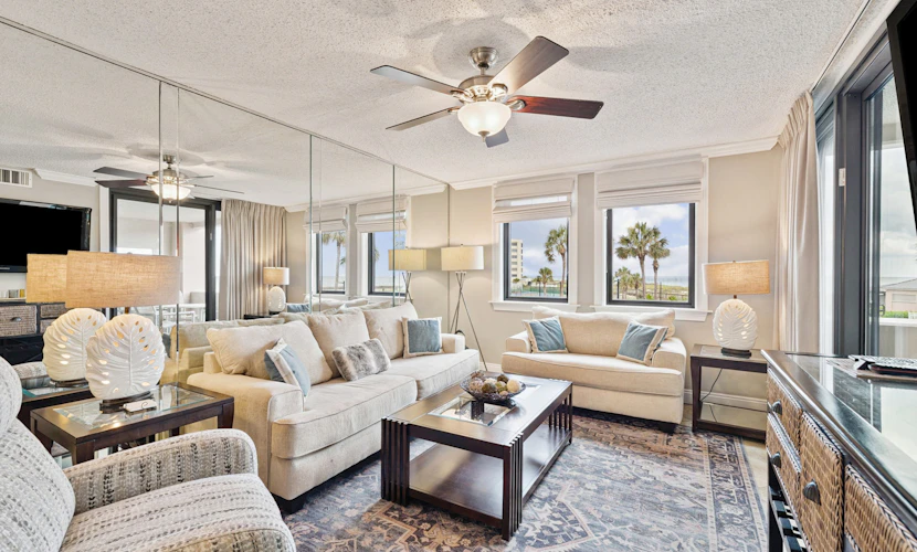 Bright ocean-view condo with community pool and direct beach walkway