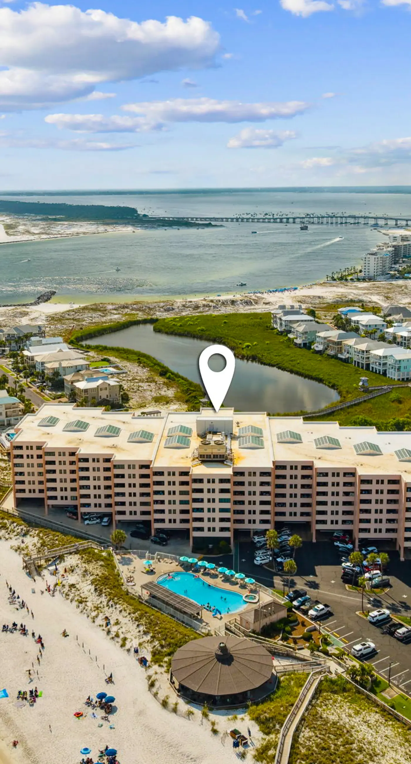 Bright ocean-view condo with community pool and direct beach walkway