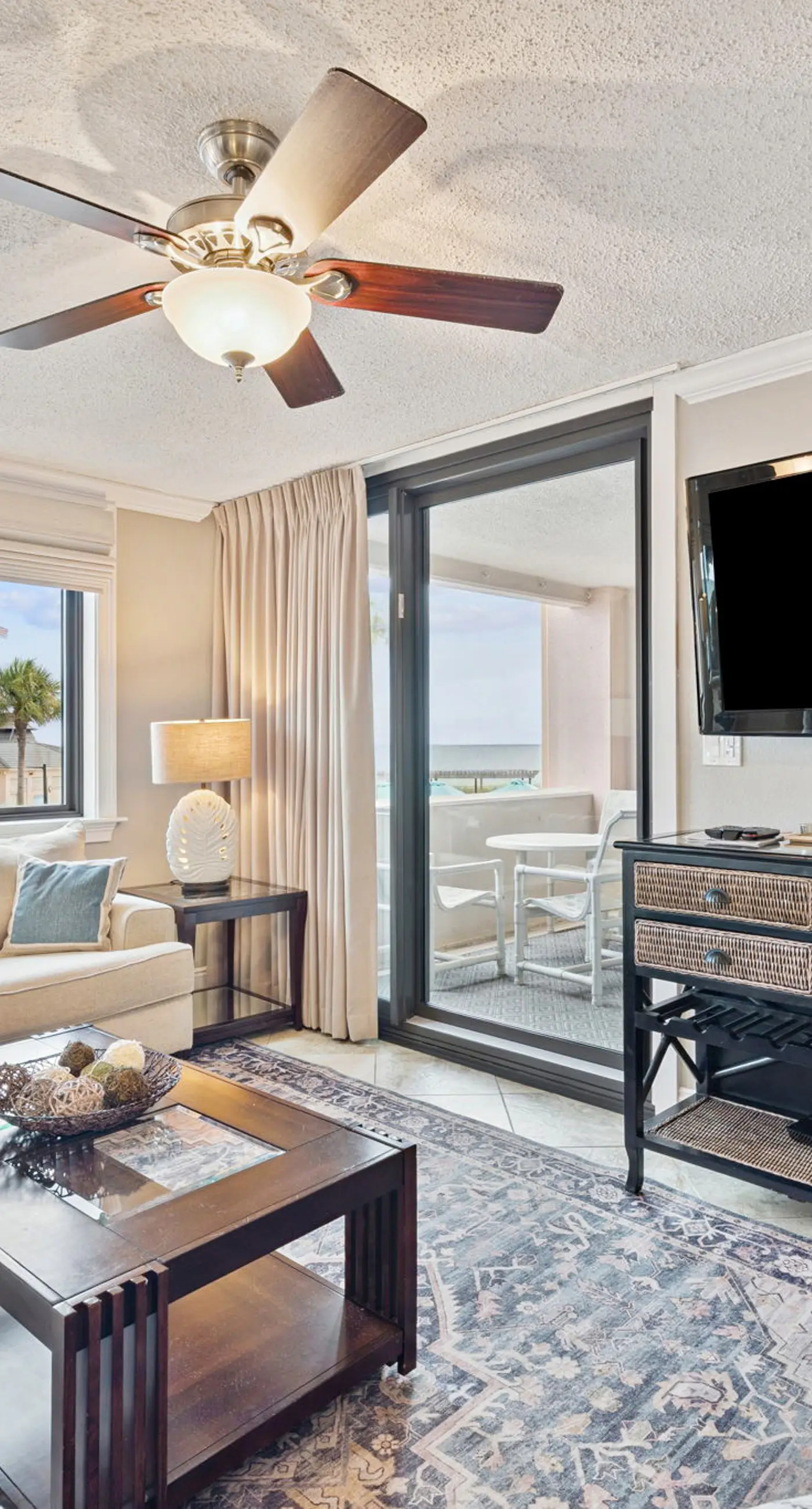 Bright ocean-view condo with community pool and direct beach walkway