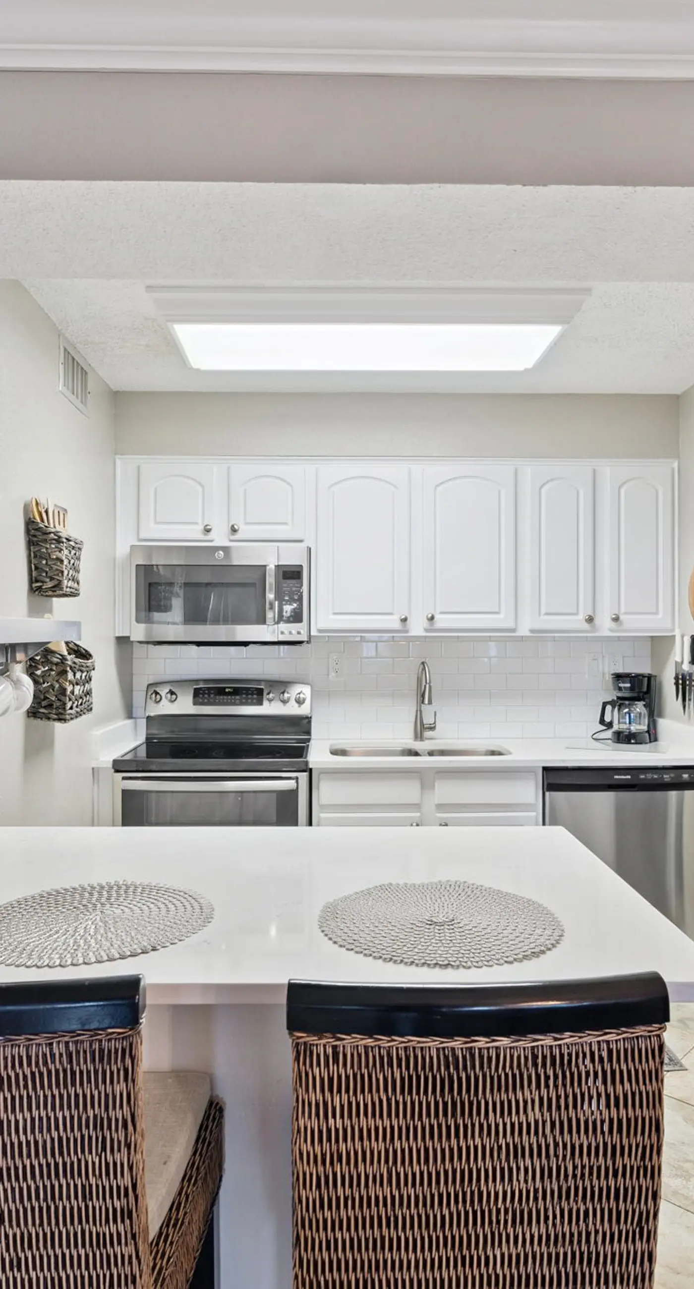 Bright ocean-view condo with community pool and direct beach walkway