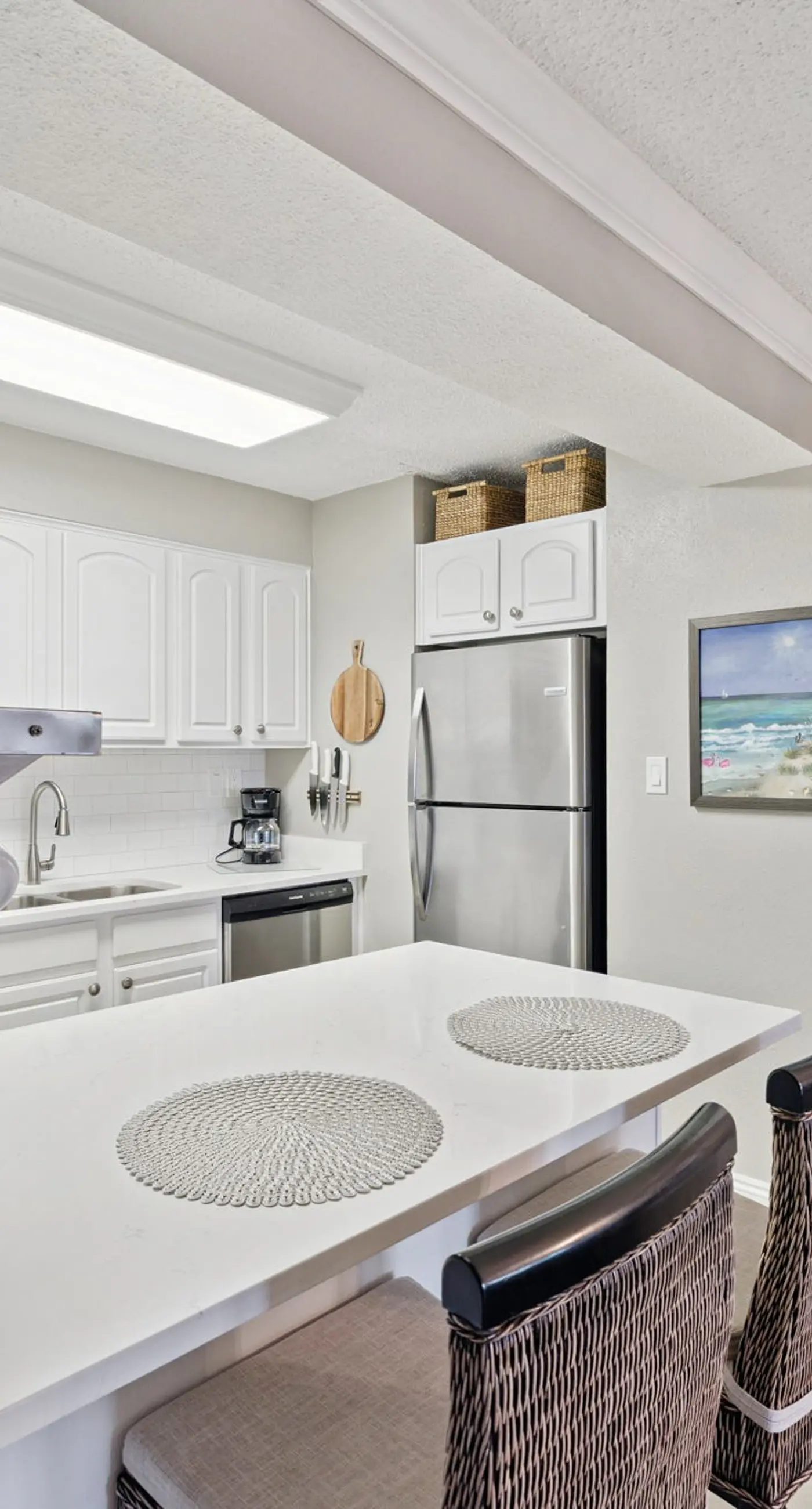 Bright ocean-view condo with community pool and direct beach walkway