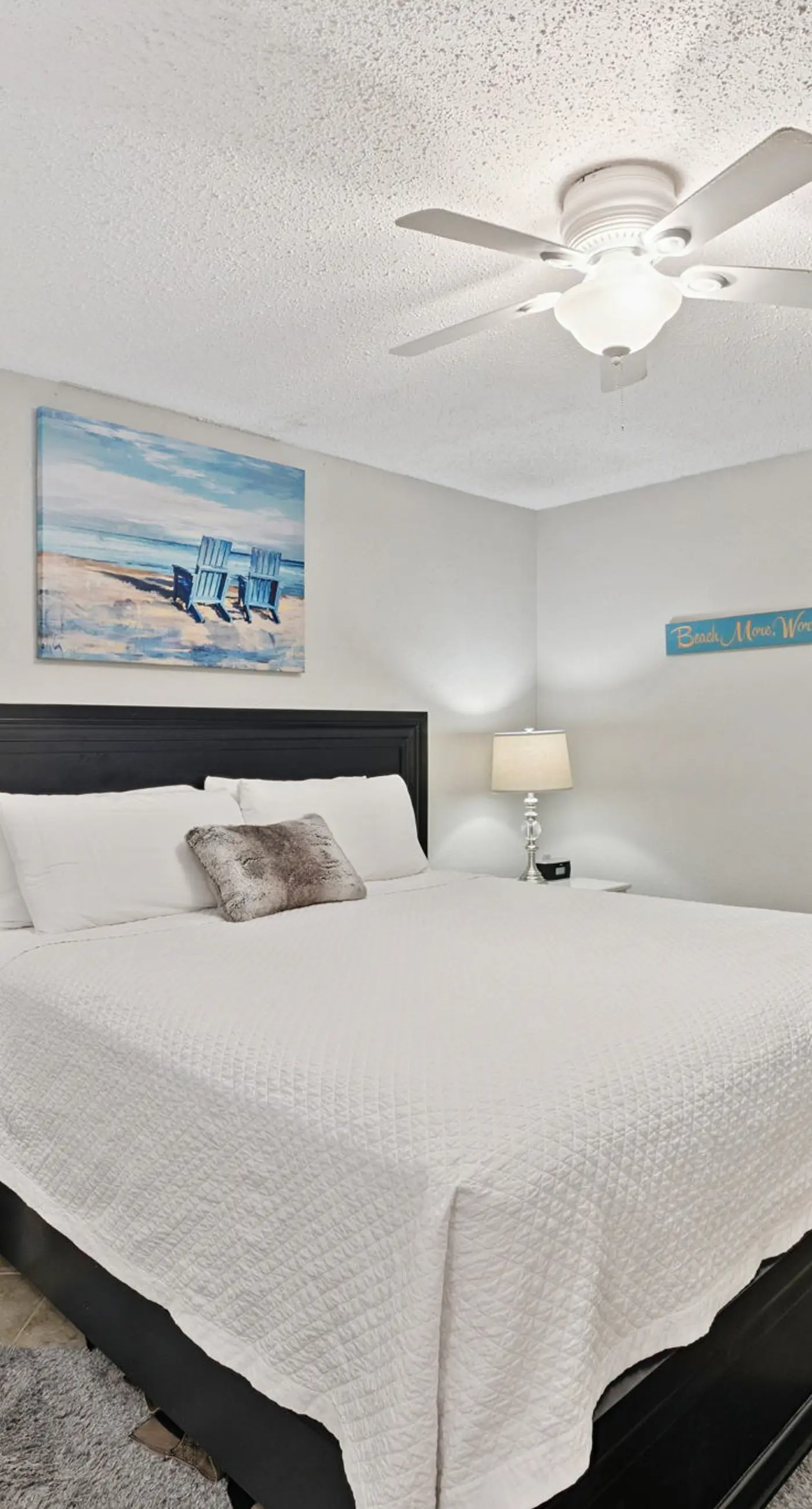Bright ocean-view condo with community pool and direct beach walkway