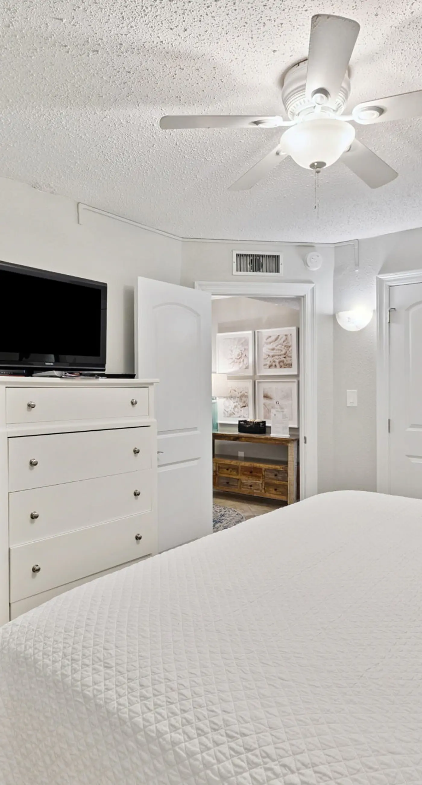 Bright ocean-view condo with community pool and direct beach walkway