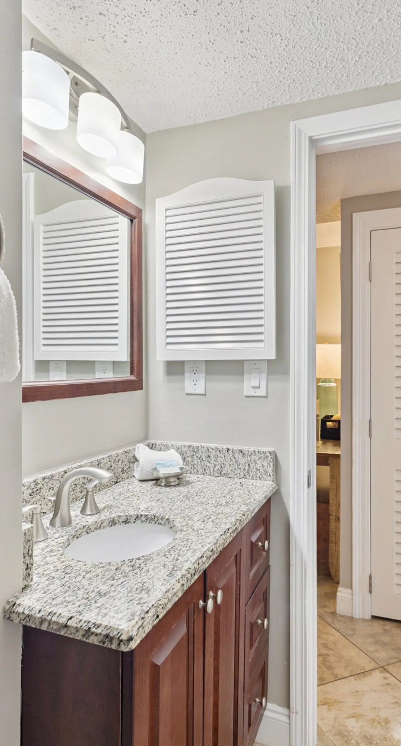 Bright ocean-view condo with community pool and direct beach walkway