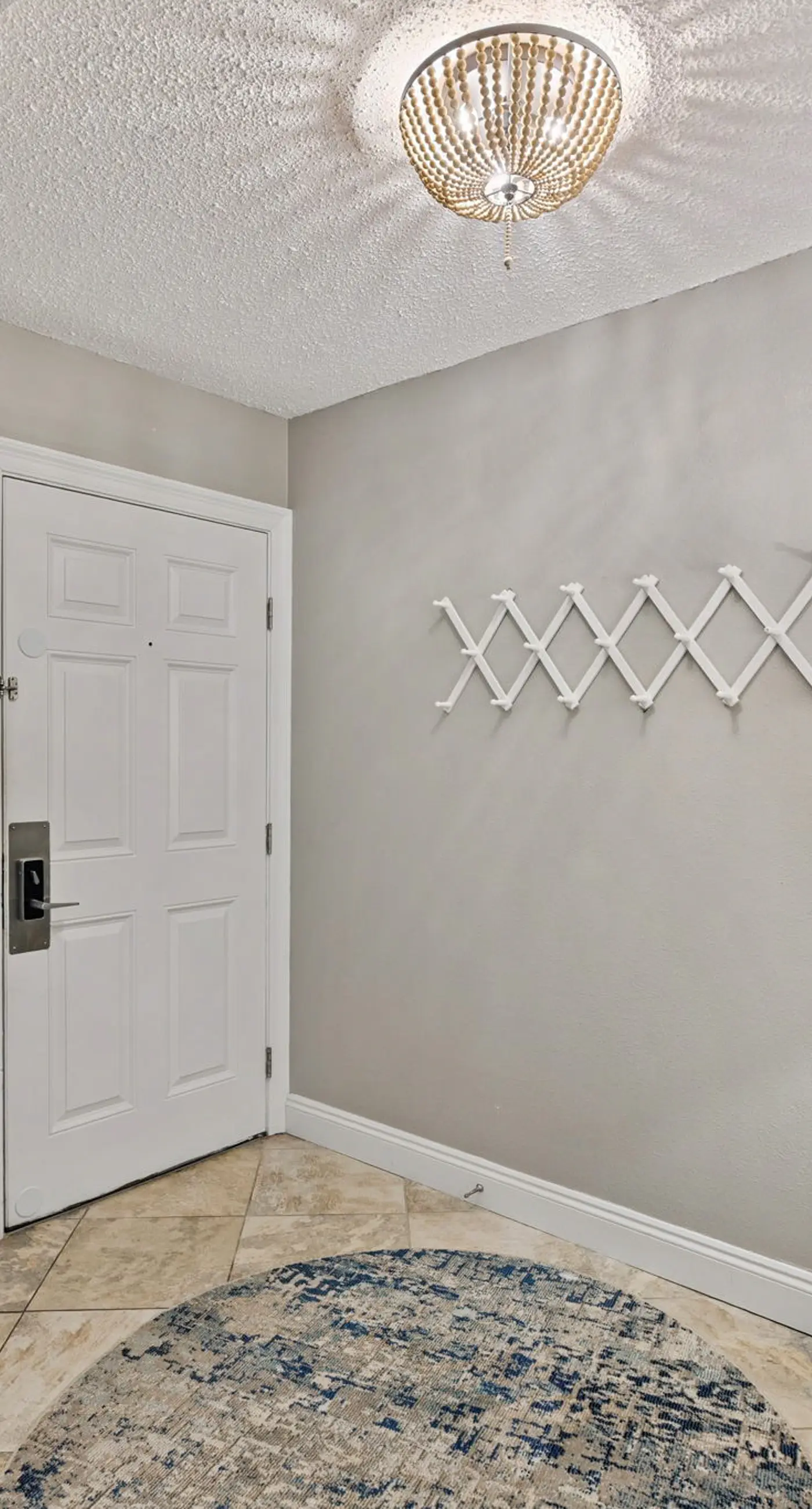 Bright ocean-view condo with community pool and direct beach walkway