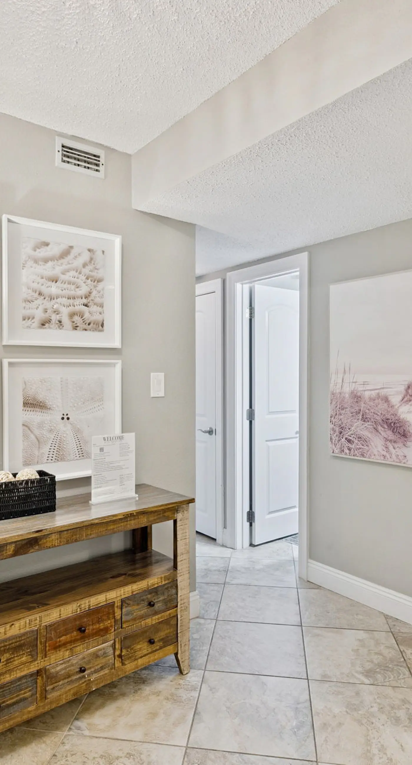 Bright ocean-view condo with community pool and direct beach walkway