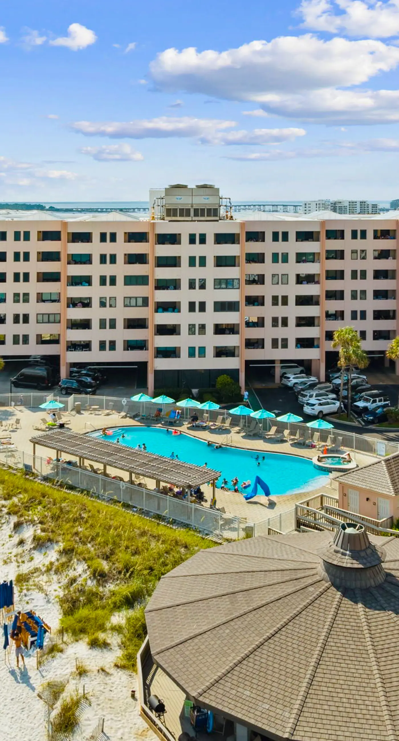 Bright ocean-view condo with community pool and direct beach walkway