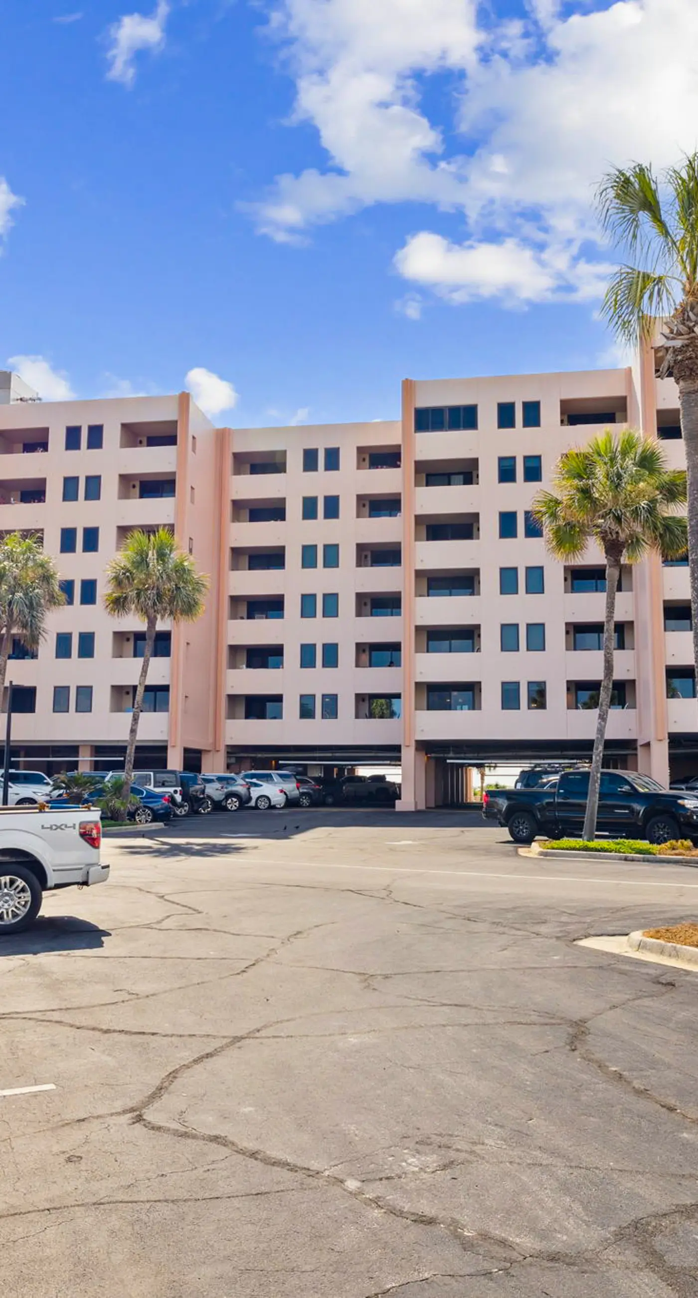 Bright ocean-view condo with community pool and direct beach walkway