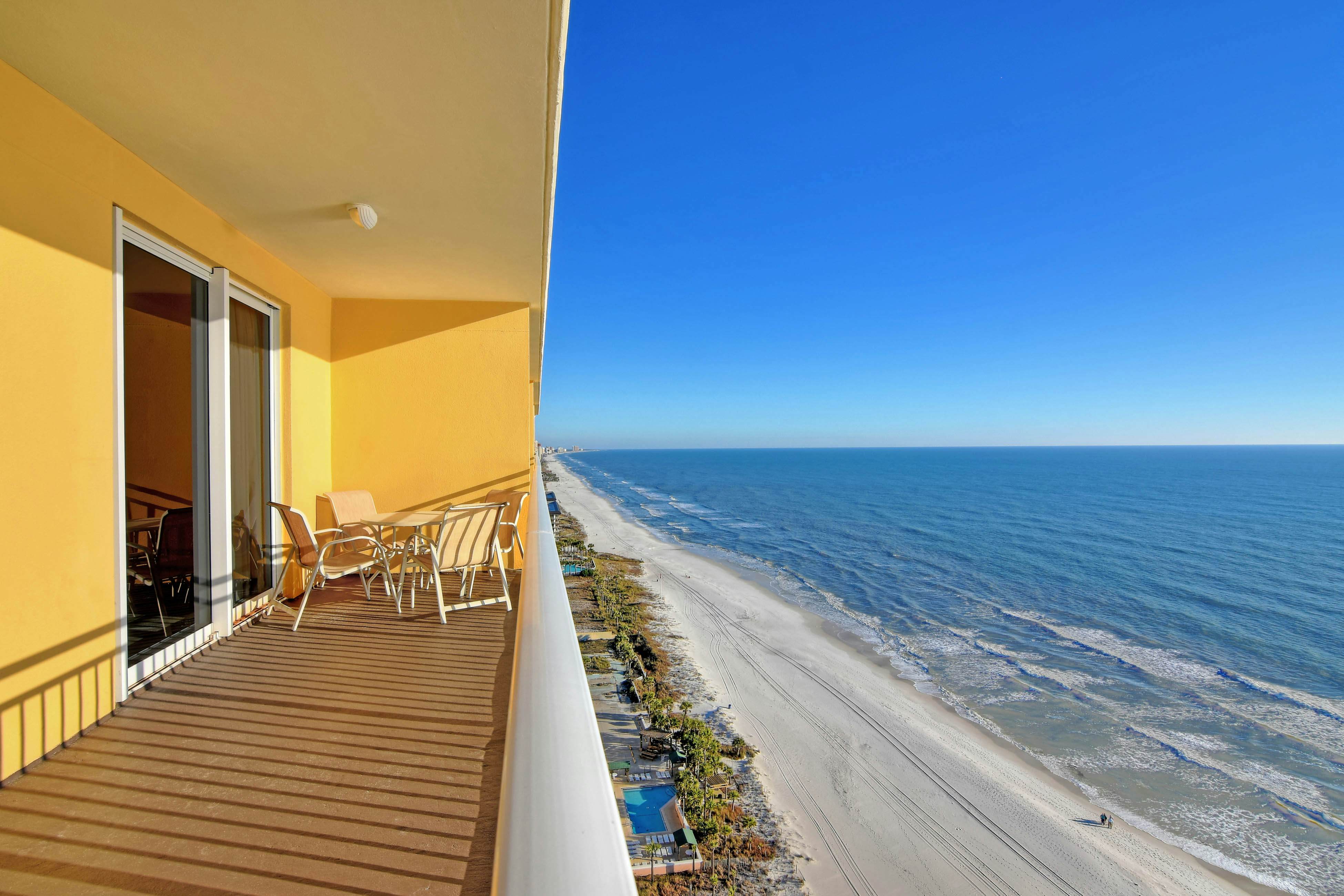 Waterfront condo with a balcony overlooking the Gulf, pool & a gym