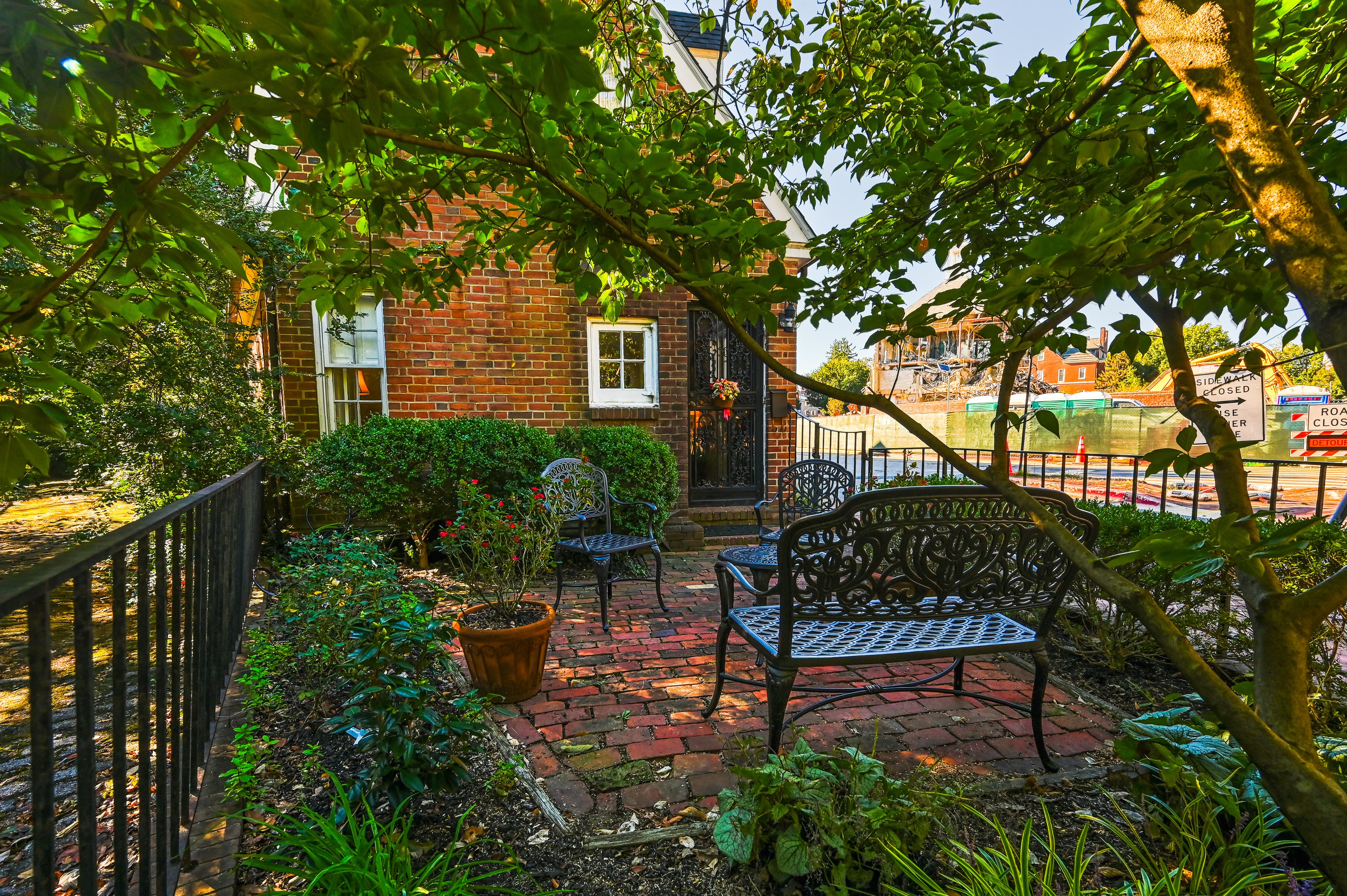 Charming brick home with patio, WiFi, AC, & W/D - walk to everything