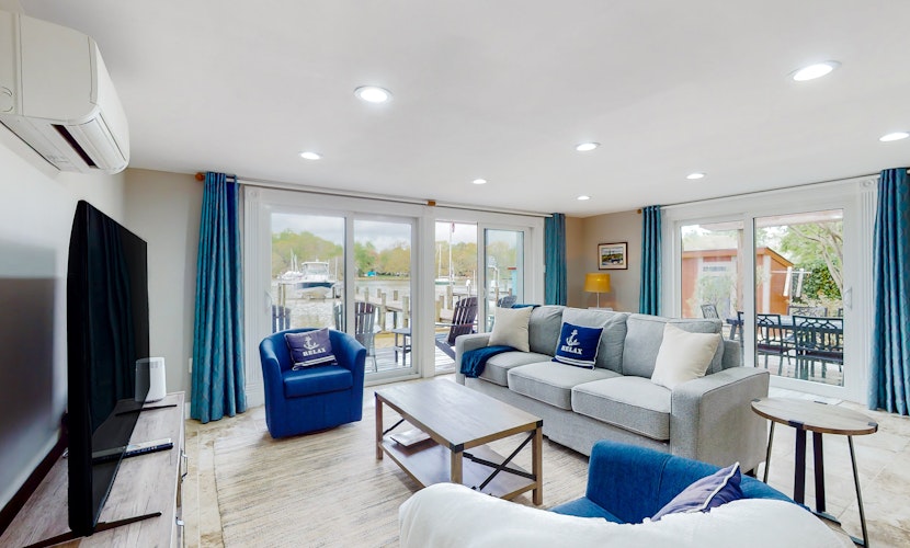 Serene waterfront home with kayaks, paddle board, grill, firepit, W/D, and AC