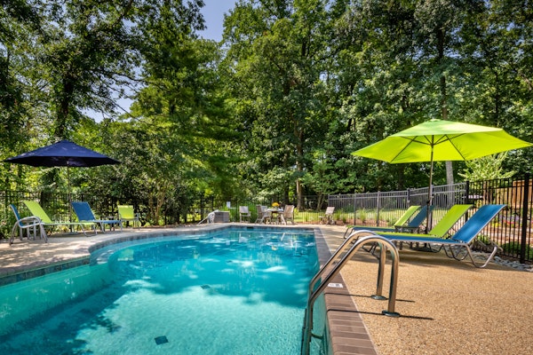 Spacious home with an outdoor pool, screened porch, washer/dryer & central AC