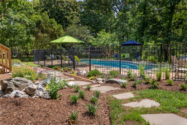 Spacious home with an outdoor pool, screened porch, washer/dryer & central AC