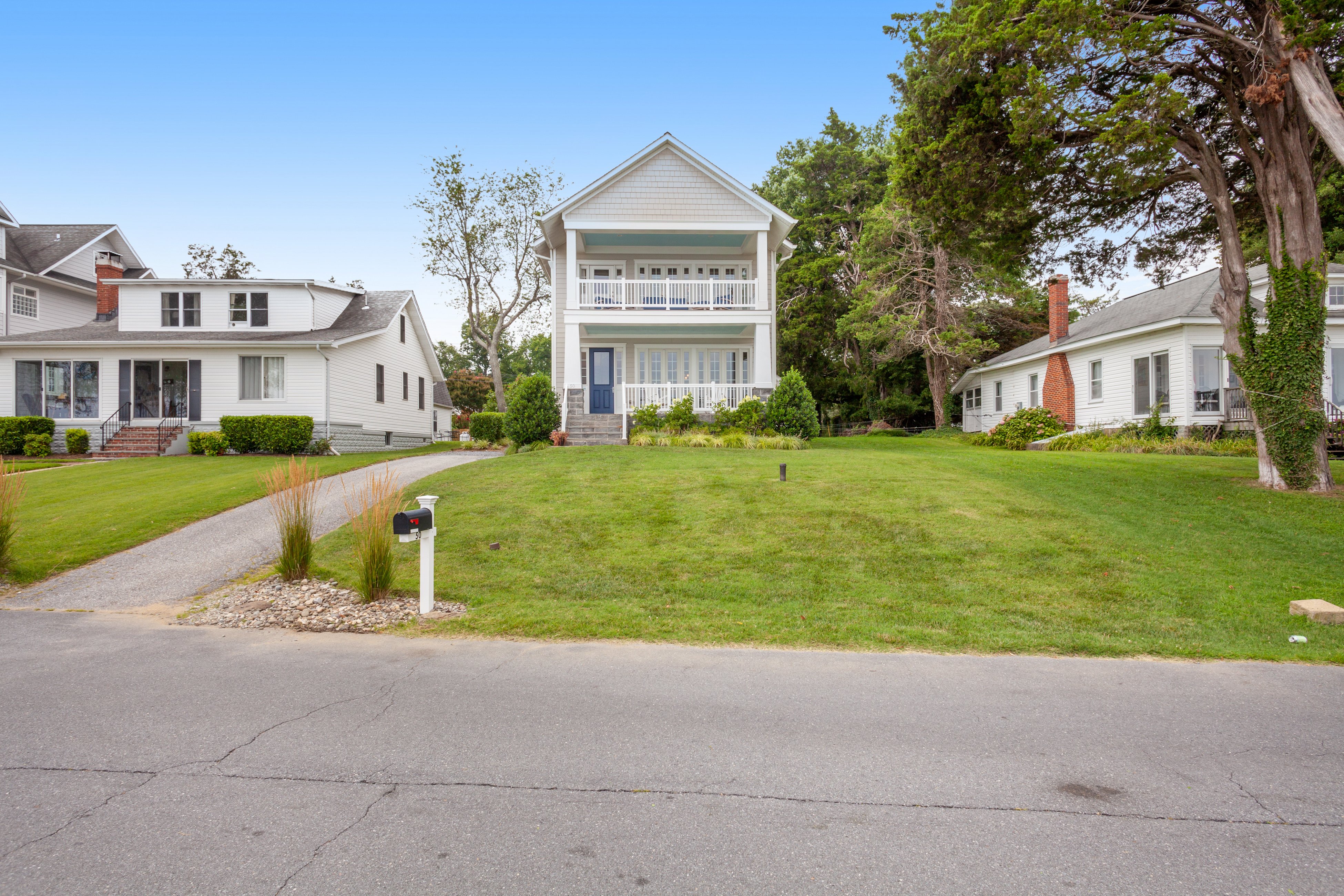 Spacious beachfront home with decks, gas grill, wet bar, gas fireplace, and W/D