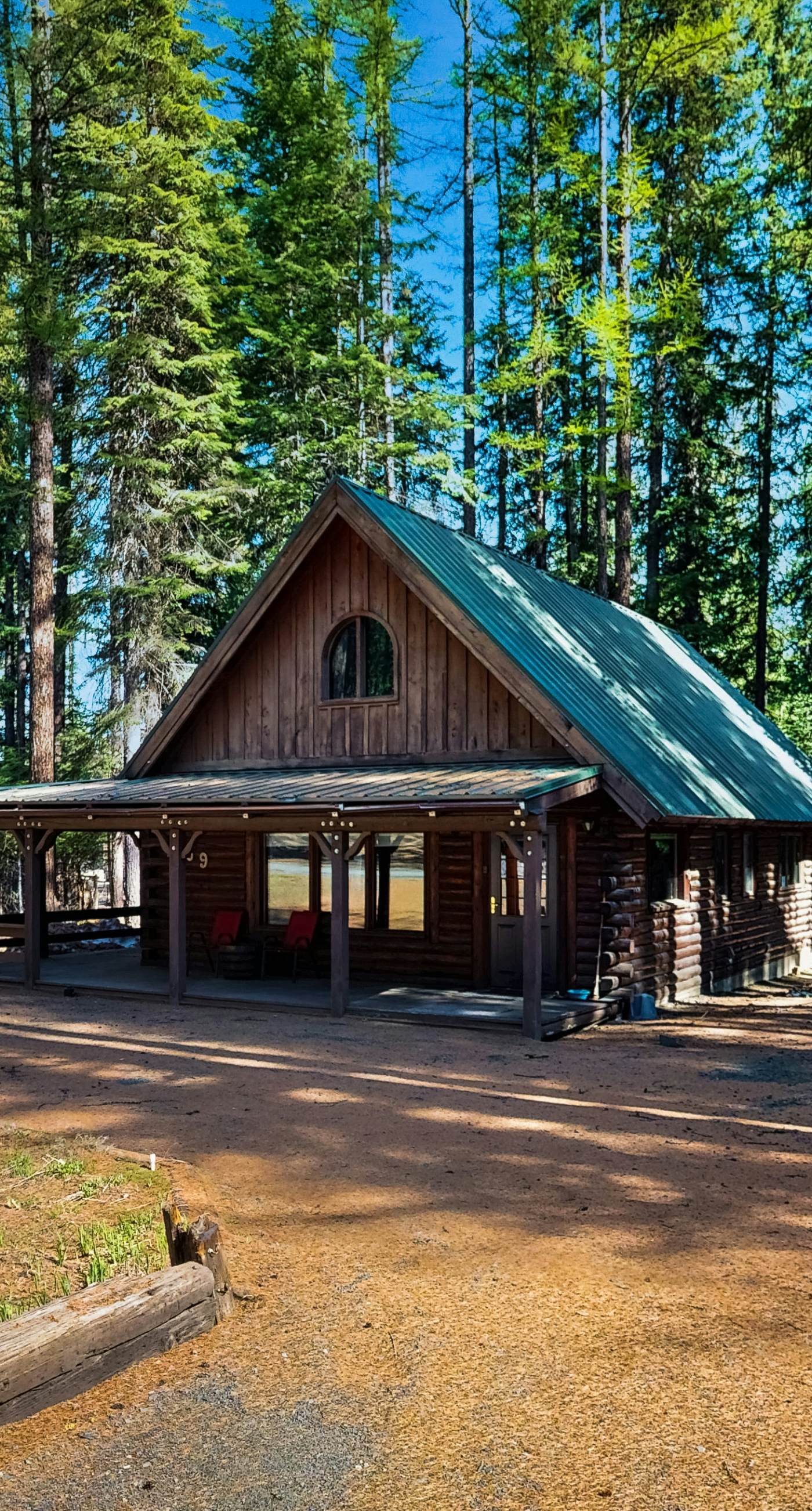 Rustic Cabin with Wrap-Around Deck Near Lake