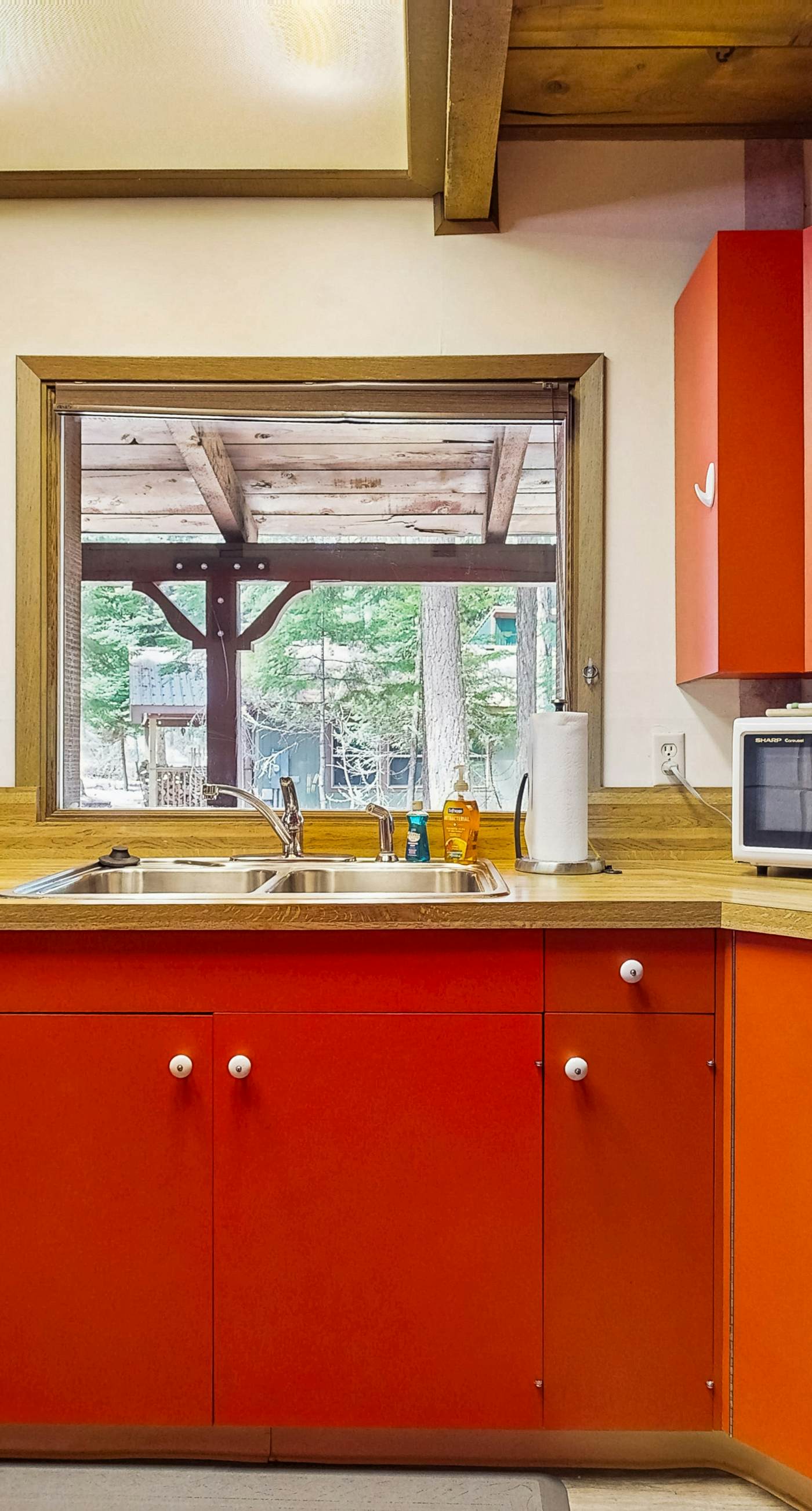 Rustic Cabin with Wrap-Around Deck Near Lake