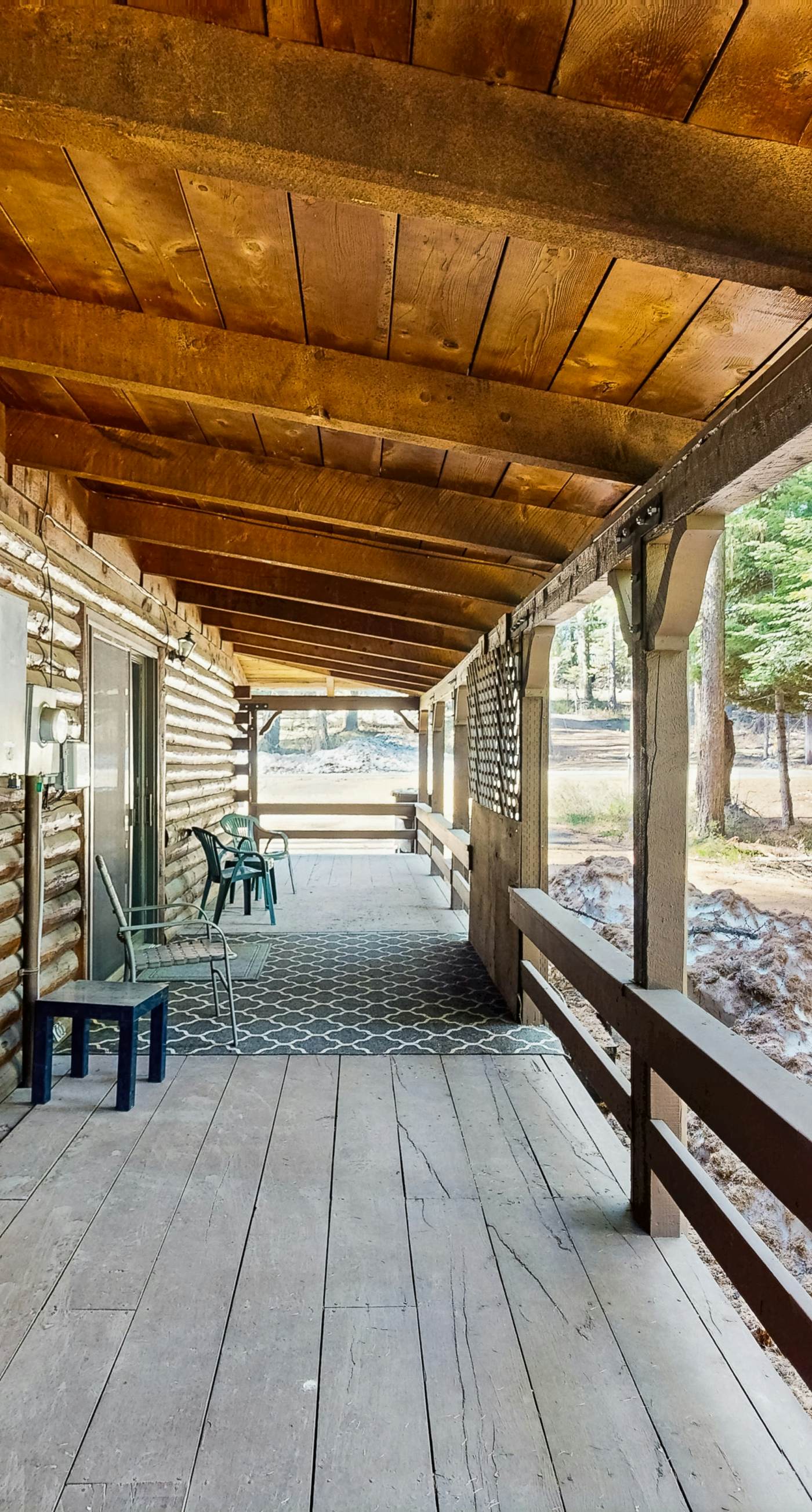 Rustic Cabin with Wrap-Around Deck Near Lake