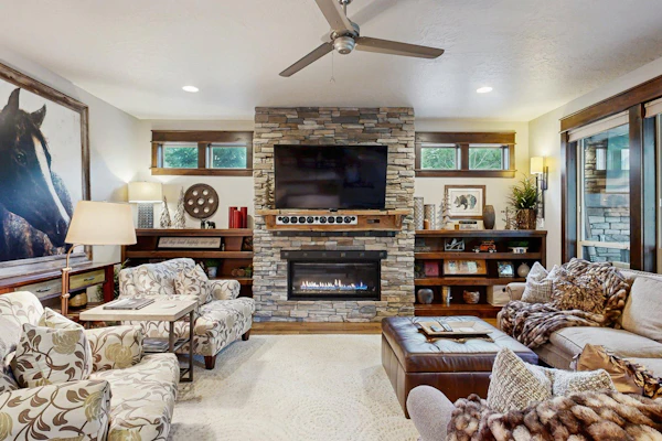 A beautifully designed, modern Spring Mountain Ranch home with three king bedrooms, a warm and inviting feel, and access to resort-style amenities including a pool, hot tub, sauna, and courts. Enjoy a spacious open layout, covered patio, firepit, outdoor TV, and a comfortable setting just minutes from downtown McCall.