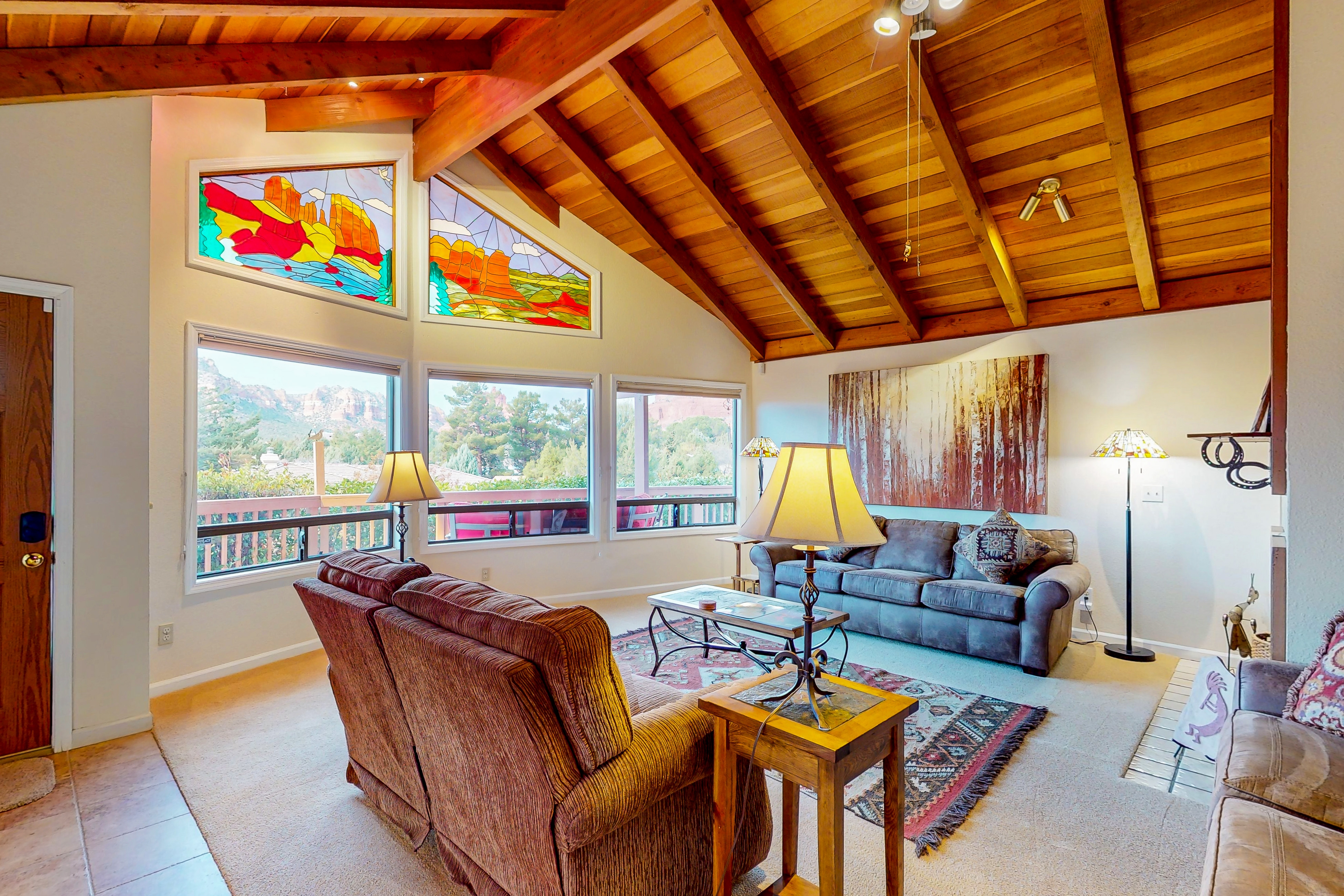 Arizona-themed home with huge deck, private hot tub, central AC, W/D, media room