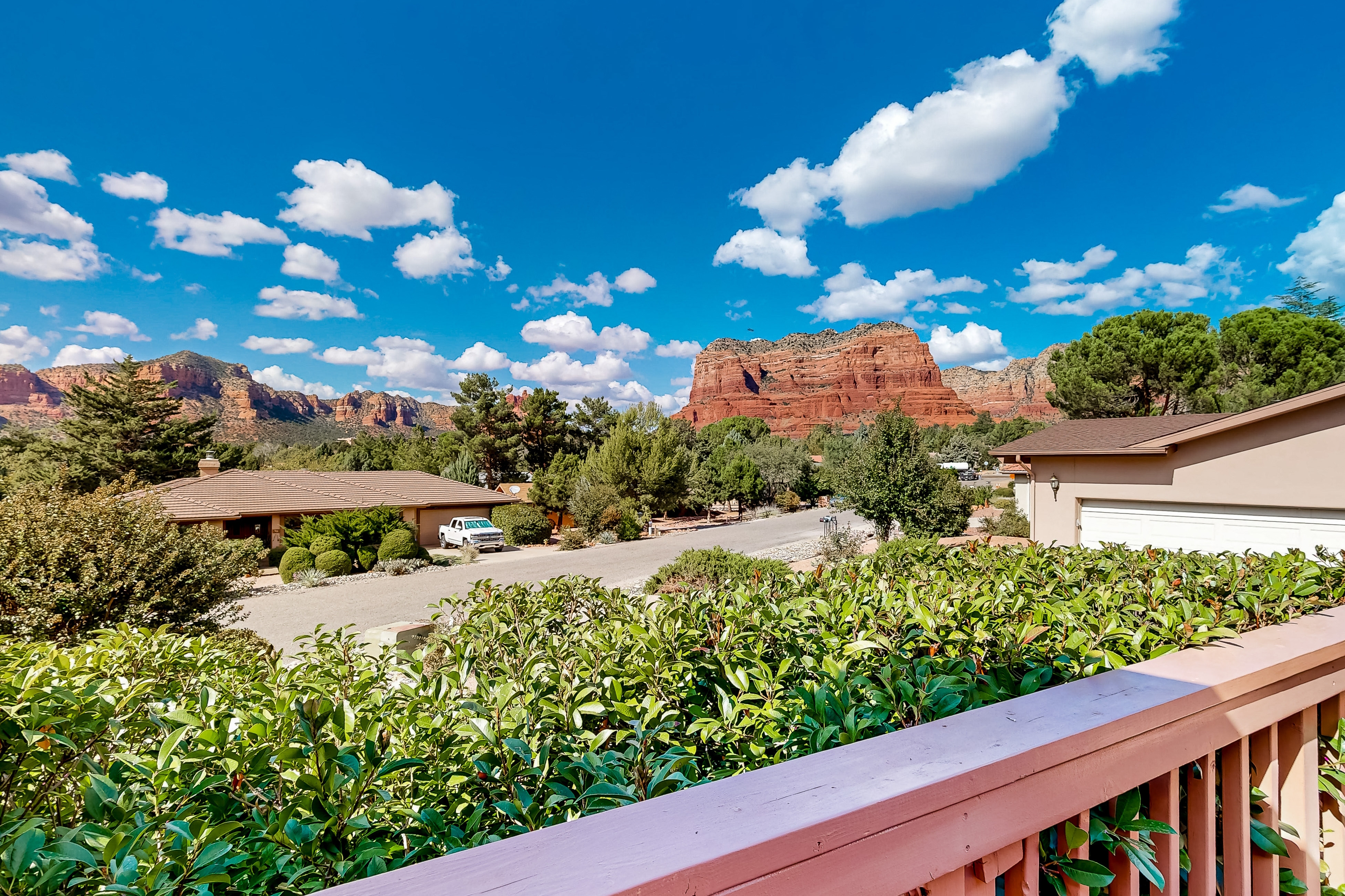 Arizona-themed home with huge deck, private hot tub, central AC, W/D, media room