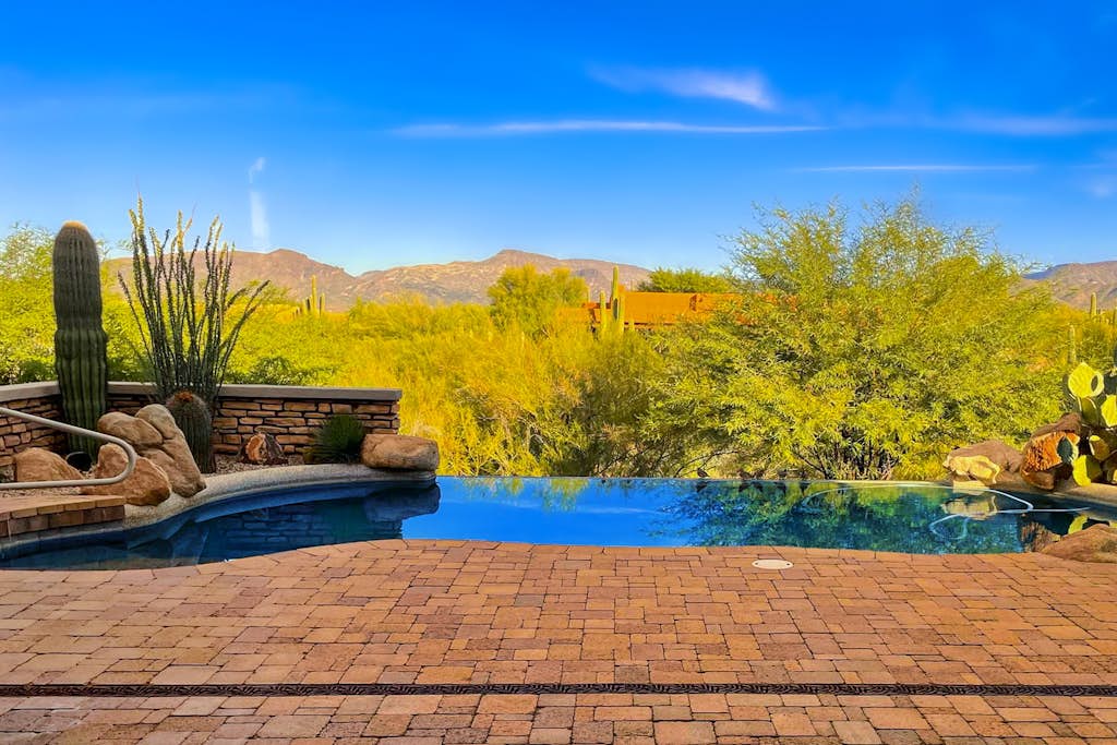 Beautiful mountain-view home with fireplace, private pool, grill, patio & W/D