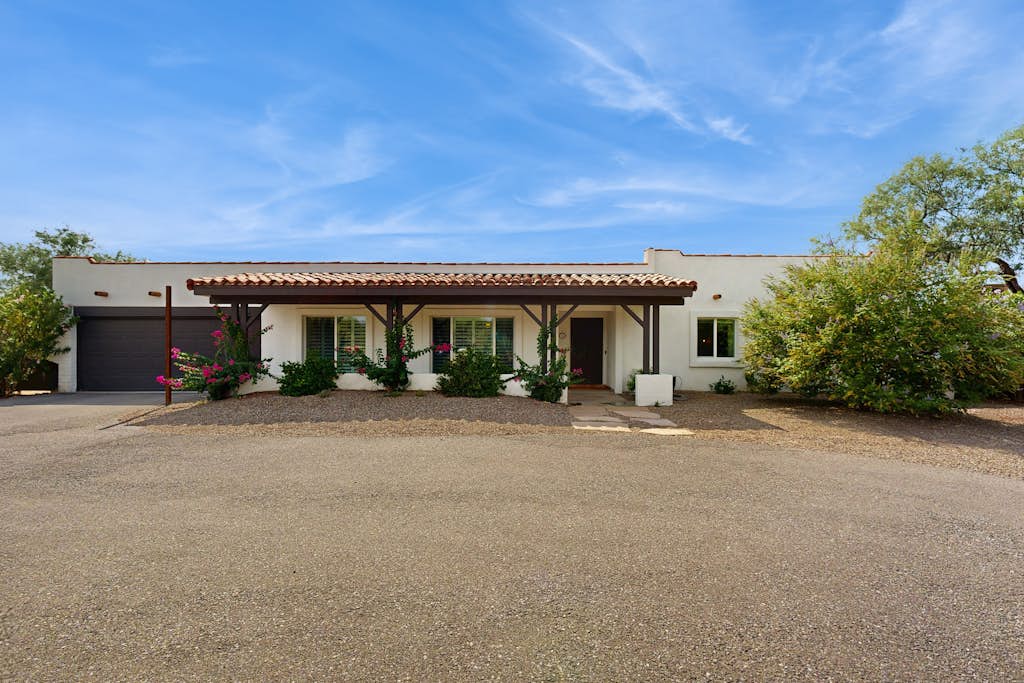 Dog-friendly modern stay with a heated private pool, sun room, & grill