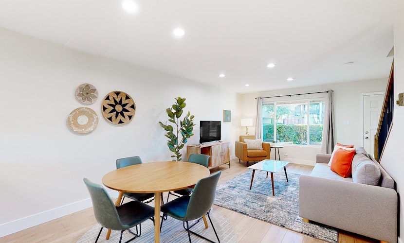 2-story dog-friendly condo with patio, outdoor pool, W/D, streaming, partial AC