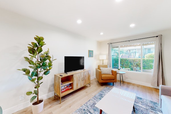 2-story dog-friendly condo with patio, outdoor pool, W/D, streaming, partial AC