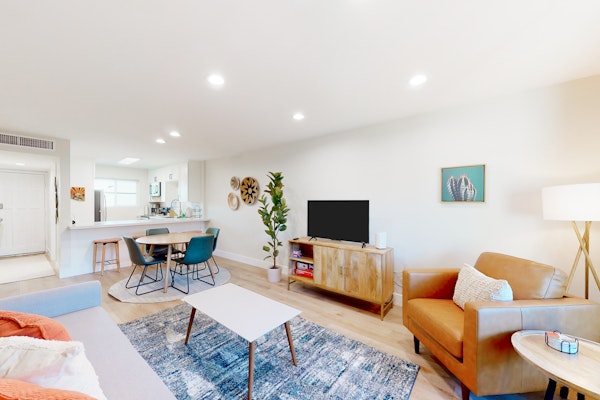 2-story dog-friendly condo with patio, outdoor pool, W/D, streaming, partial AC