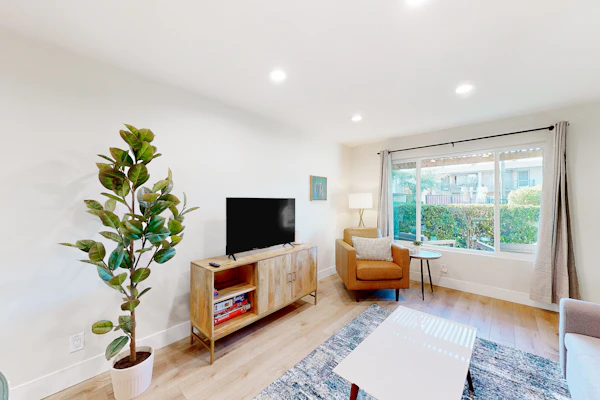 2-story dog-friendly condo with patio, outdoor pool, W/D, streaming, partial AC