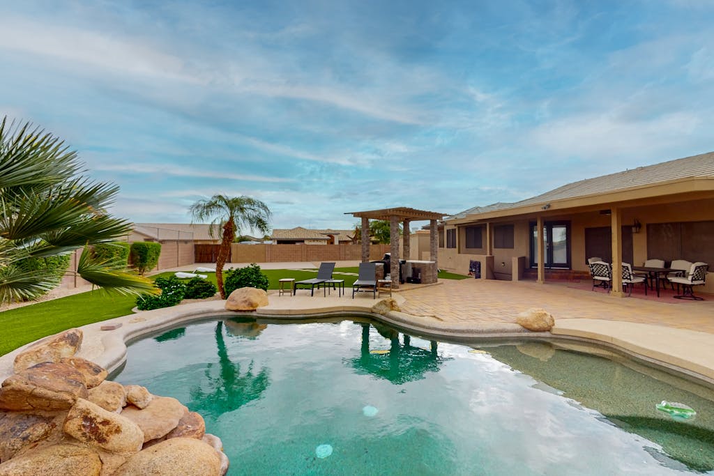 Peoria Paradise: Poolside Vibes & Family Good Times. Spacious Backyard with Pool