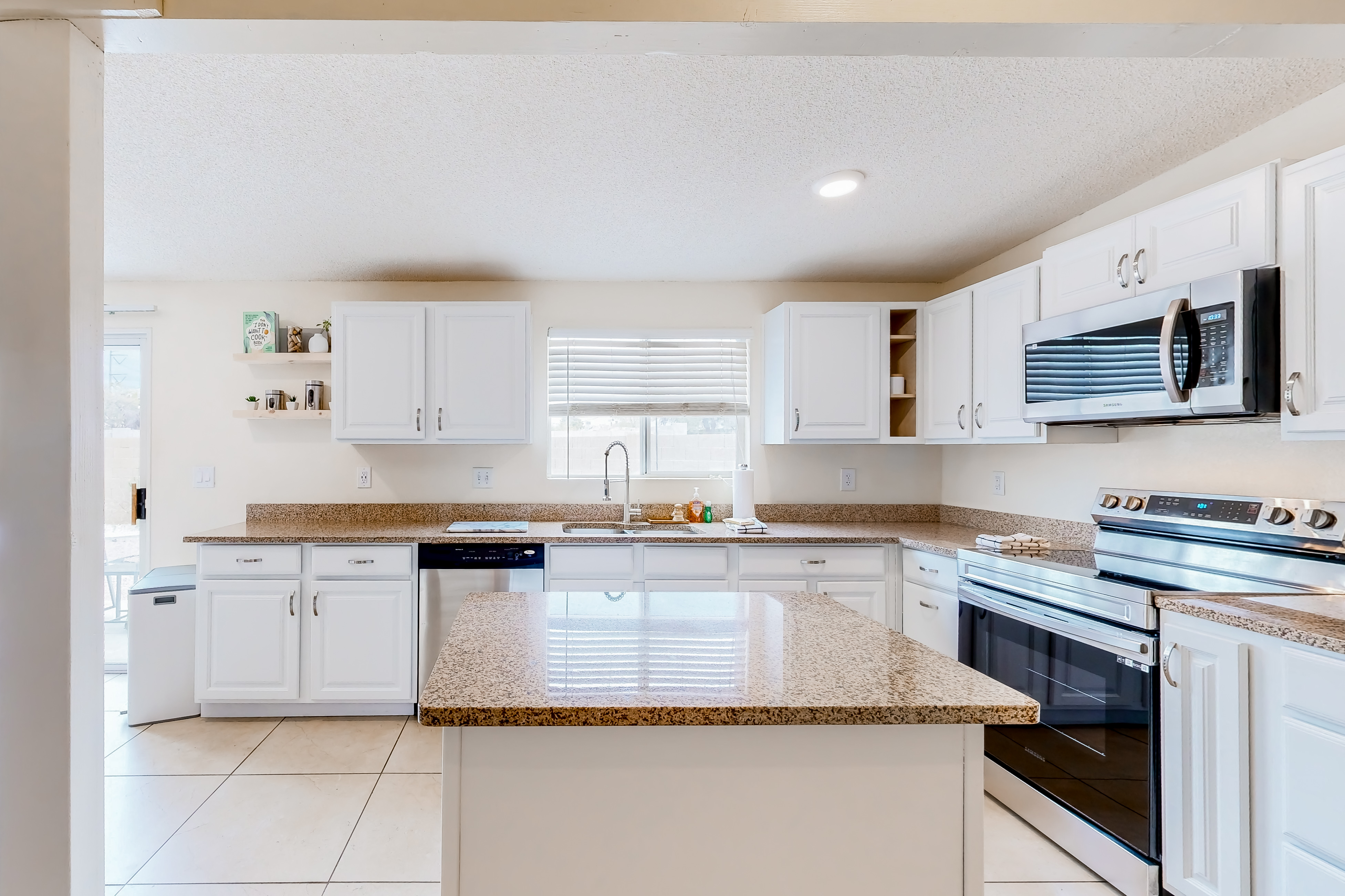 Charming home near walking paths with a work desk, grill, & patio - dog-friendly