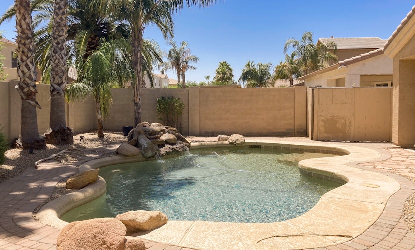 inviting home with private pool, patio, grill, washer/dryer, & central AC