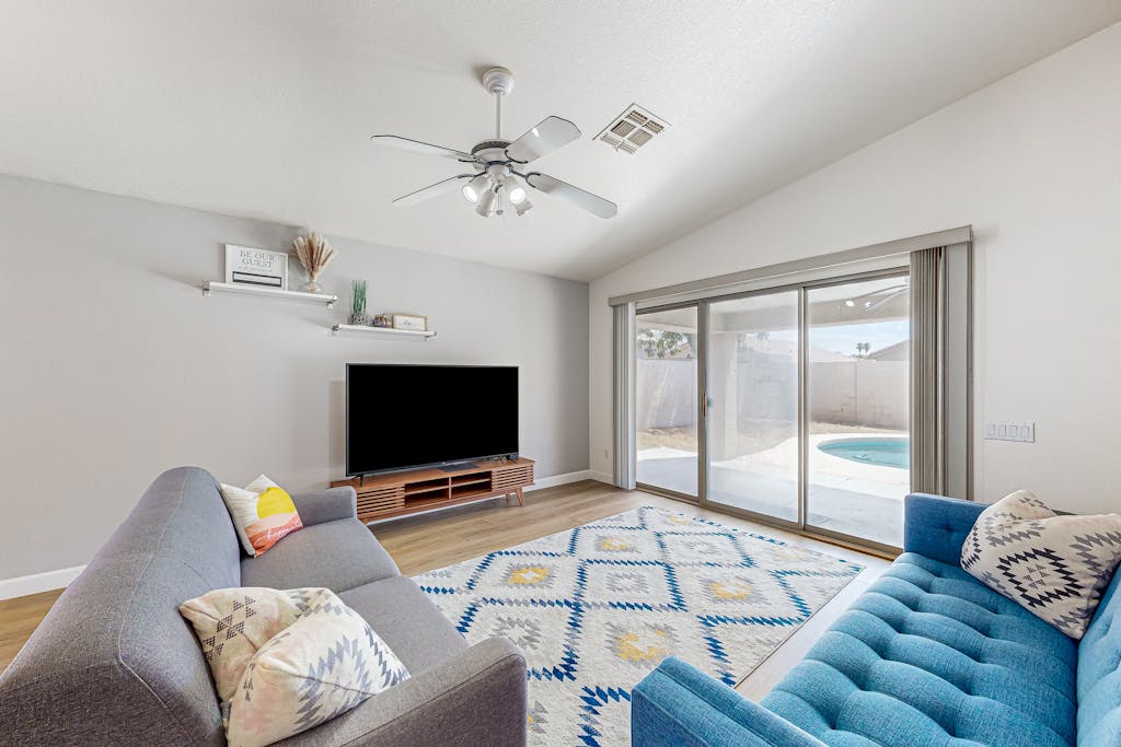 Updated home with private pool, enclosed yard, covered patio, grill, & W/D