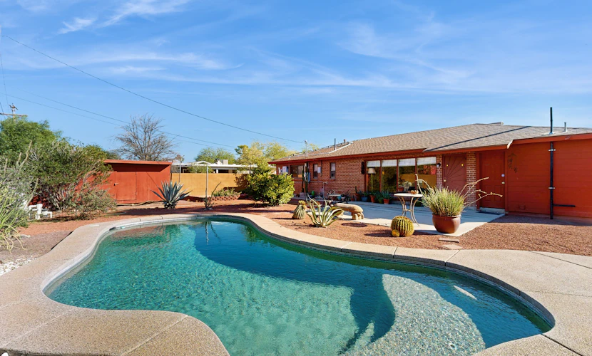 Sun-soaked & charming dog-friendly retreat with private pool, large patio, & W/D