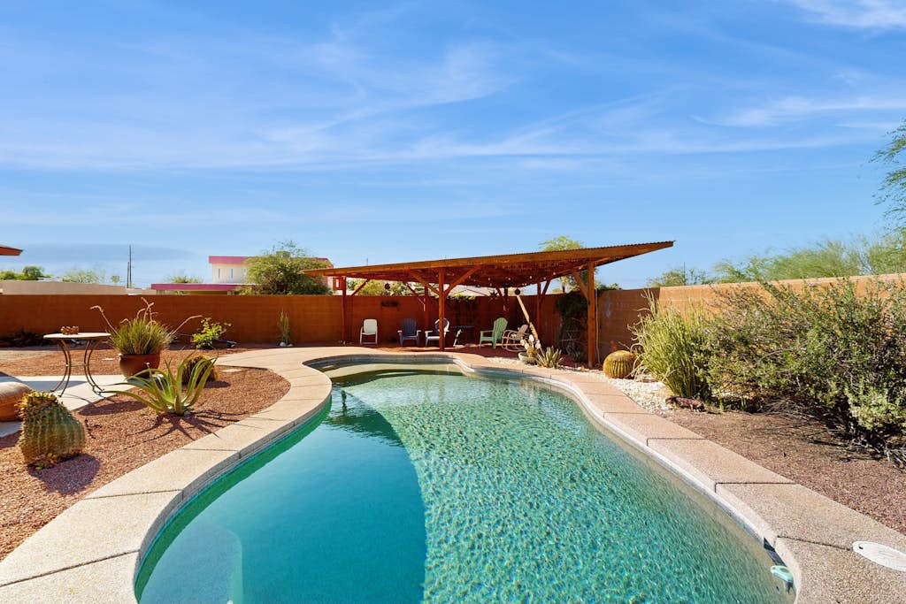 Sun-soaked & charming dog-friendly retreat with private pool, large patio, & W/D