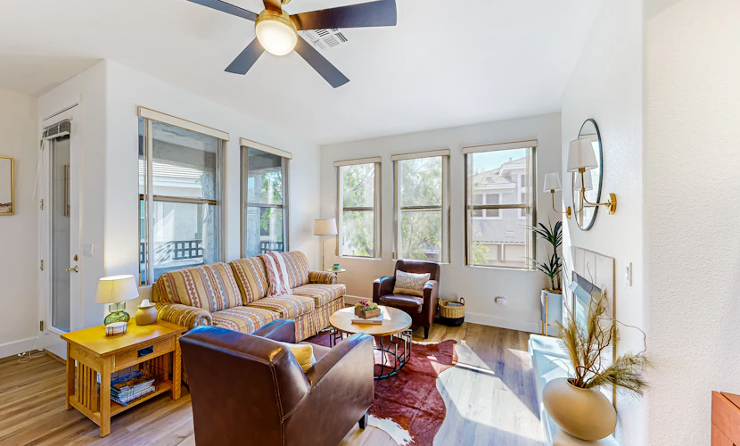 Gated community condo with pool, hot tub, gym, & private patio - near golf