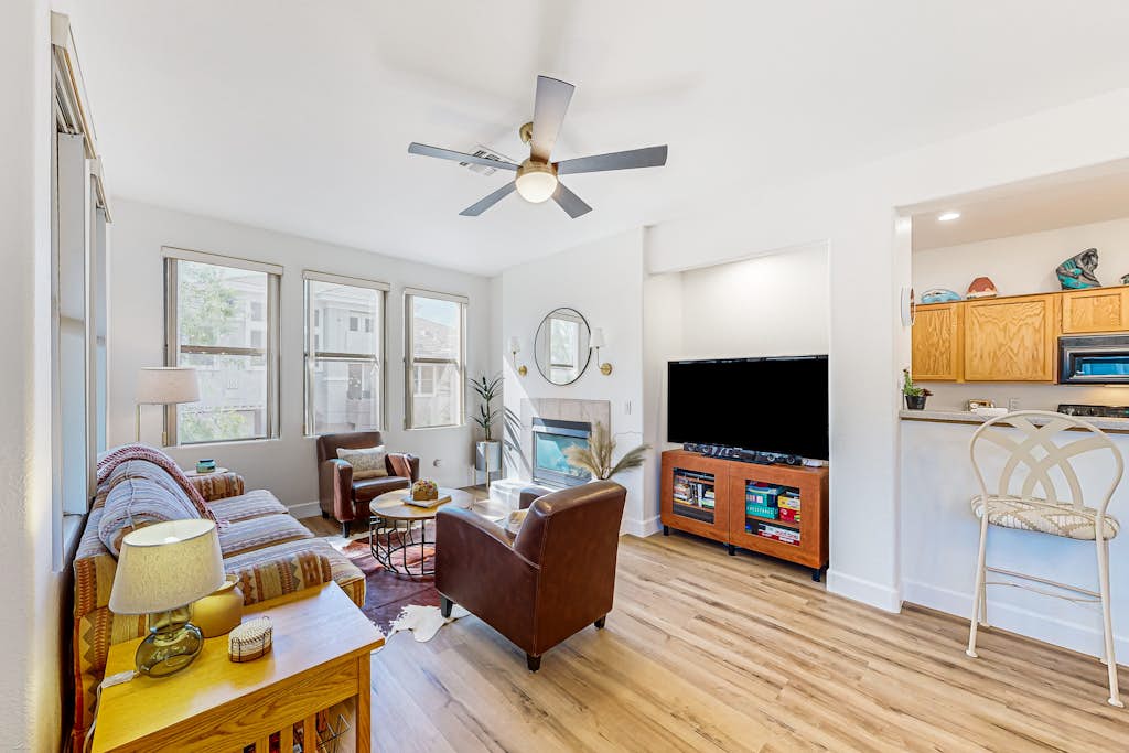 Gated community condo with pool, hot tub, gym, & private patio - near golf