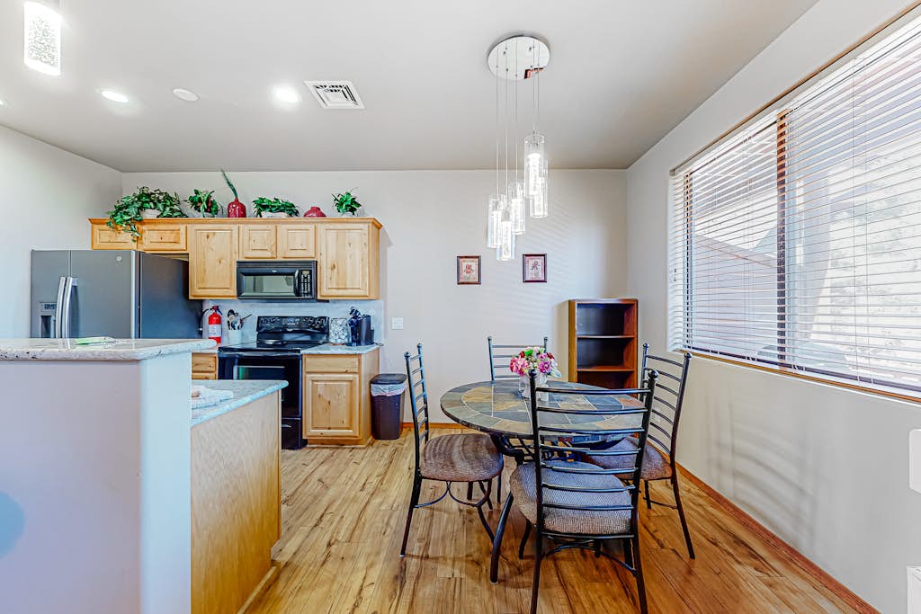 Scenic mountain condo with balcony, gas grill, smart TVS, central air, & W/D
