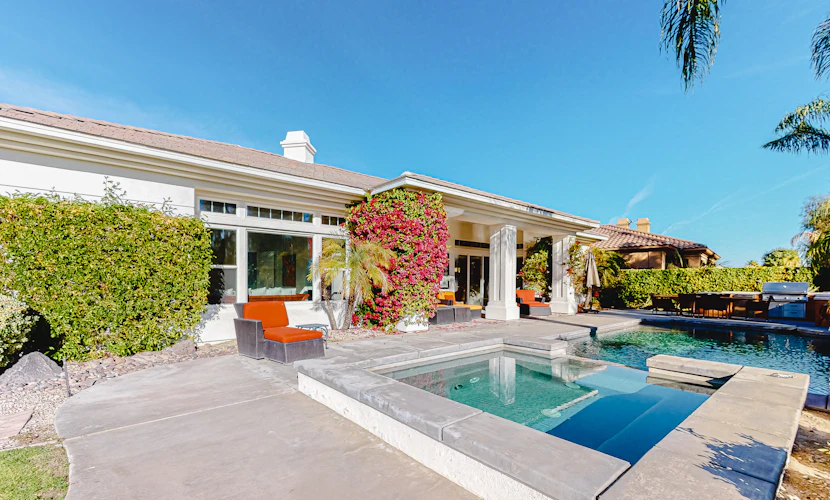 Pristine home w/ a wet bar, outdoor kitchen, private pool, & spa