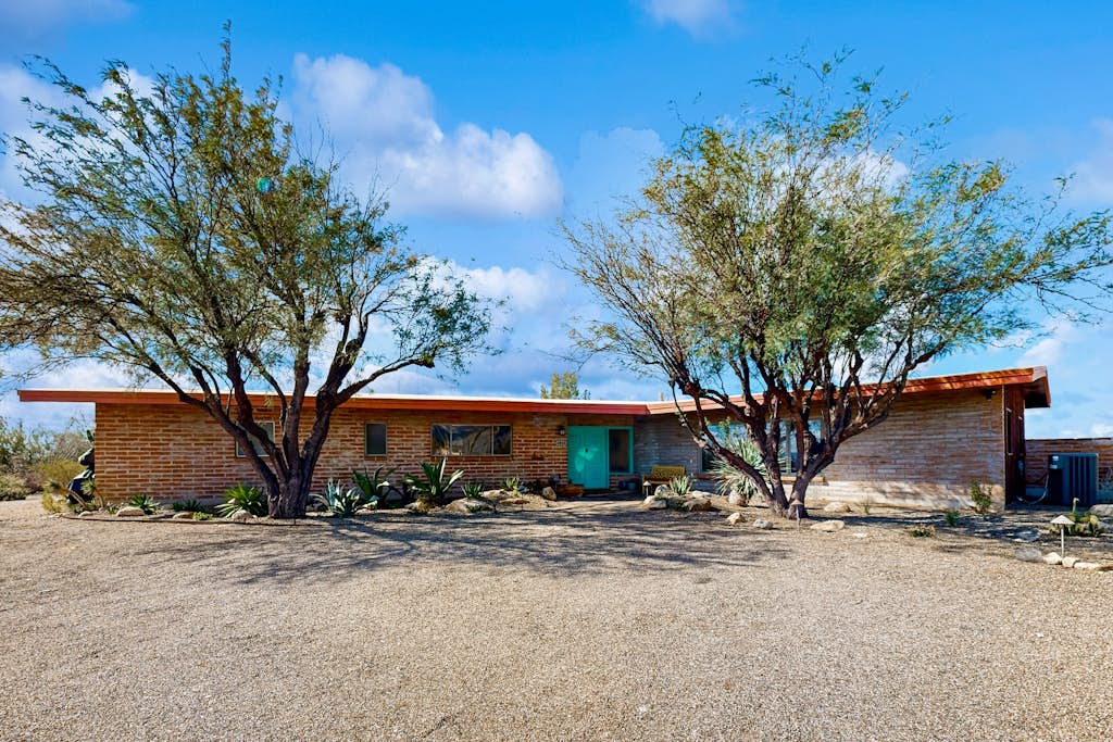 Dog-friendly oasis with yard, amazing pool, furnished patio, & washer/dryer