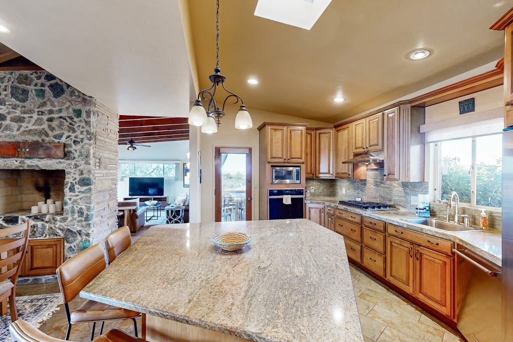 Dog-friendly oasis with yard, amazing pool, furnished patio, & washer/dryer